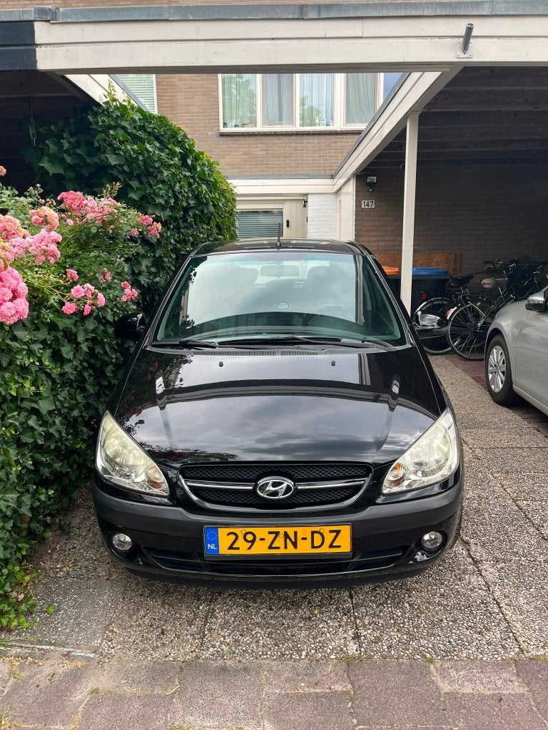 Hyundai Getz 1.4 5DRS 2008 Zwart - Active Cool, Auto's, Hyundai, Voorwielaandrijving, 40 €/maand, Zwart, 4 cilinders