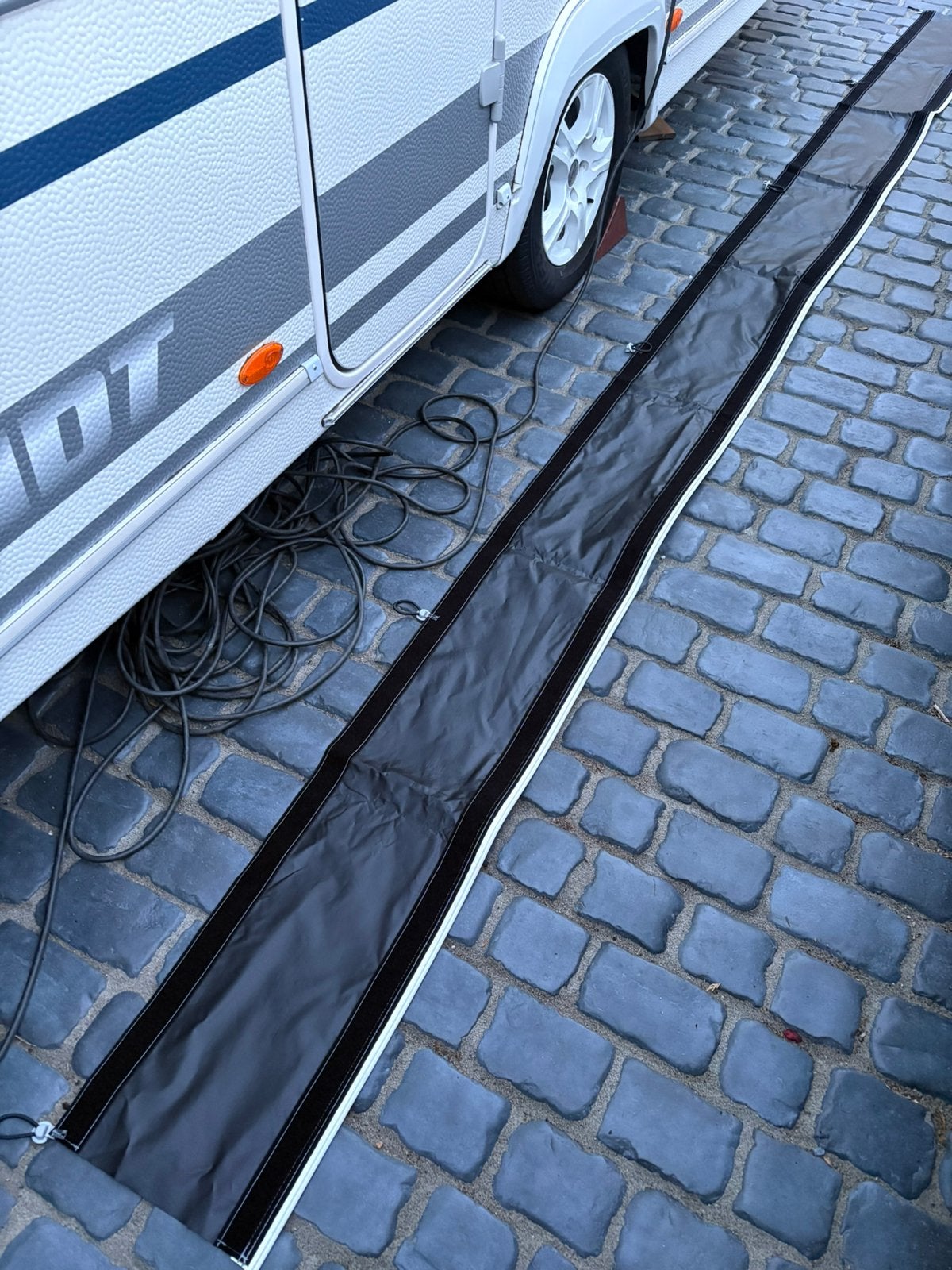 Tochtstrook unico met wielflap maat 12 en 12.1, Caravans en Kamperen, Caravan accessoires, Ophalen of Verzenden, Zo goed als nieuw
