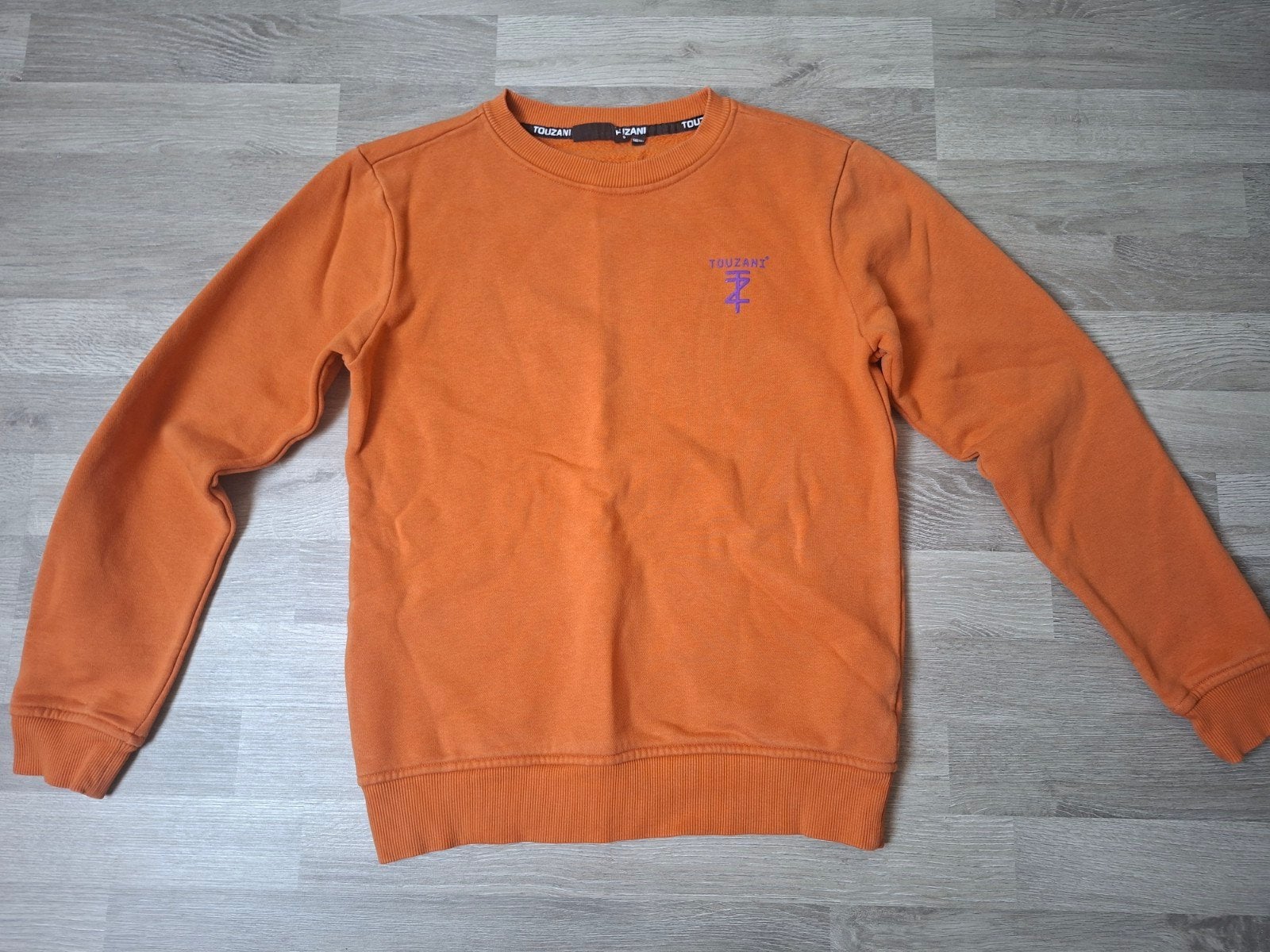 Oranje Touzani trui maat 146/152, Jongen of Meisje, Trui of Vest, Ophalen of Verzenden, Zo goed als nieuw