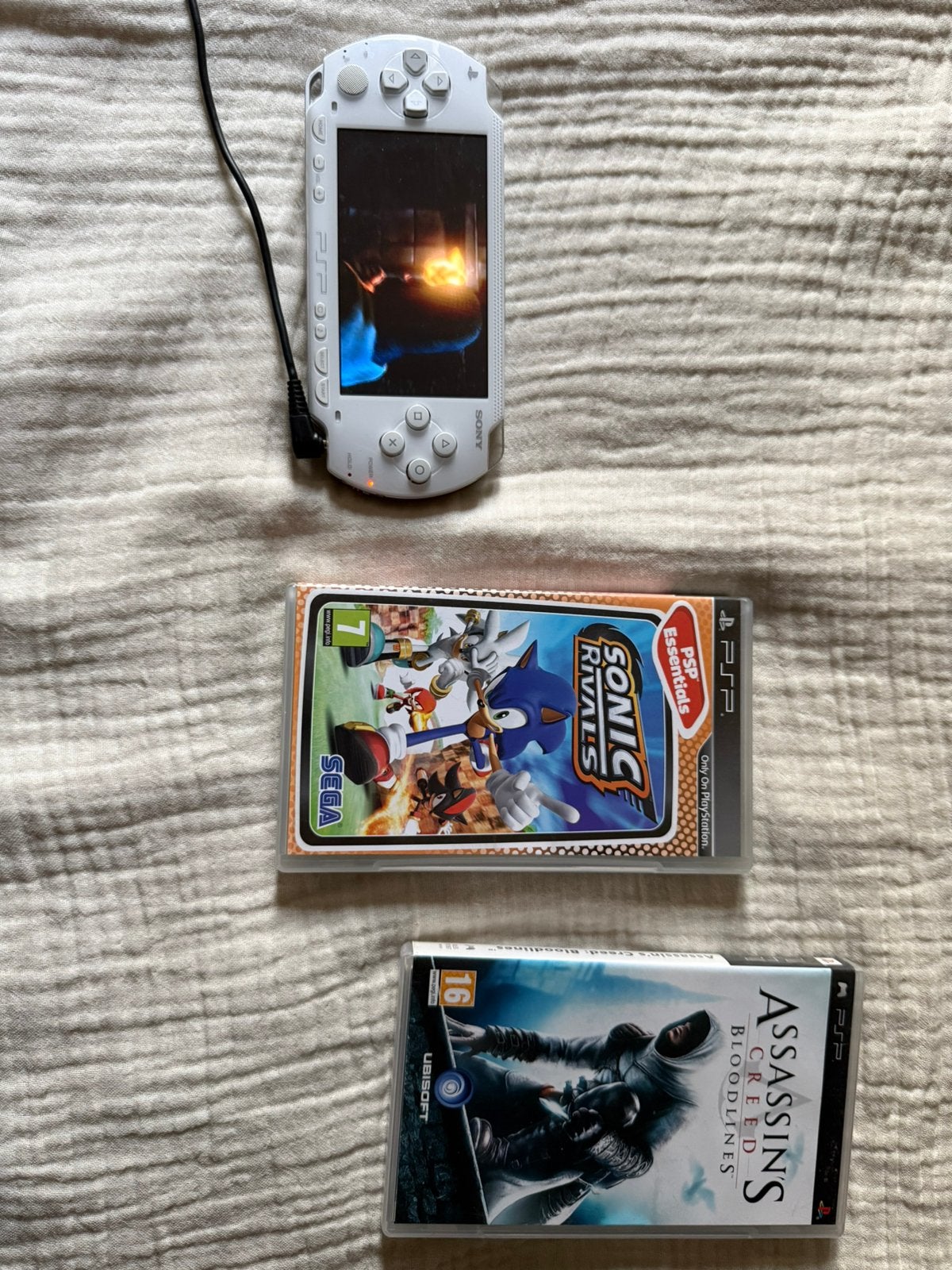 Originele psp 1000 met 2 spellen goeie staat, 1 speler, Ophalen of Verzenden, Zo goed als nieuw, Vanaf 3 jaar