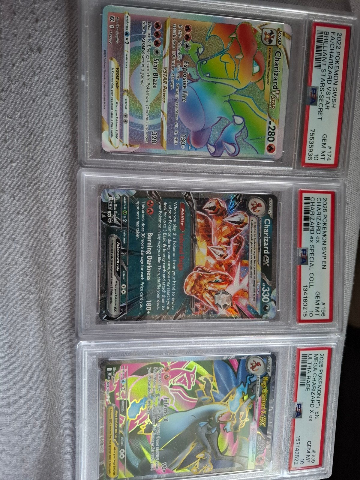 PSA 10 Charizard VSTAR, Charizard V, Mega Charizard EX, Hobby en Vrije tijd, Verzamelkaartspellen | Pokémon, Nieuw, Meerdere kaarten