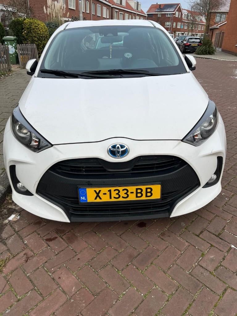 Toyota Yaris 1.5 Hybrid Dynamic 116pk(BJ 2021) Wit, Auto's, Automaat, 450 kg, 1490 cc, Vierwielaandrijving