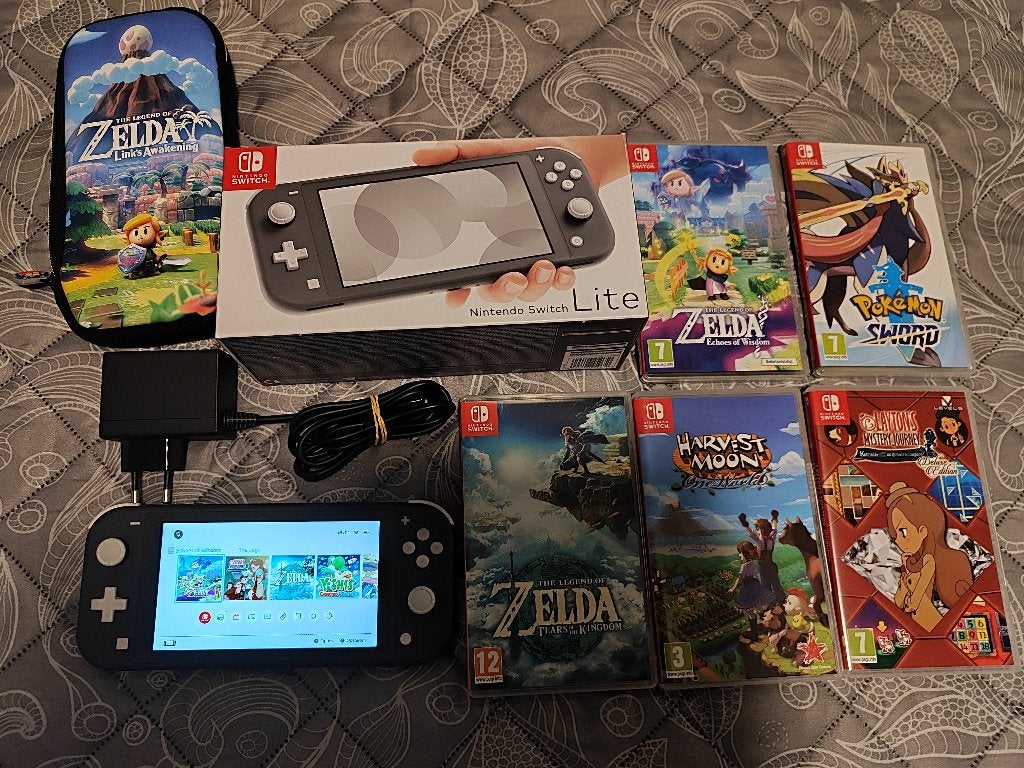 Nintendo switch lite met spellen, Spelcomputers en Games, Spelcomputers | Nintendo Switch Lite, Ophalen, Grijs, Zo goed als nieuw