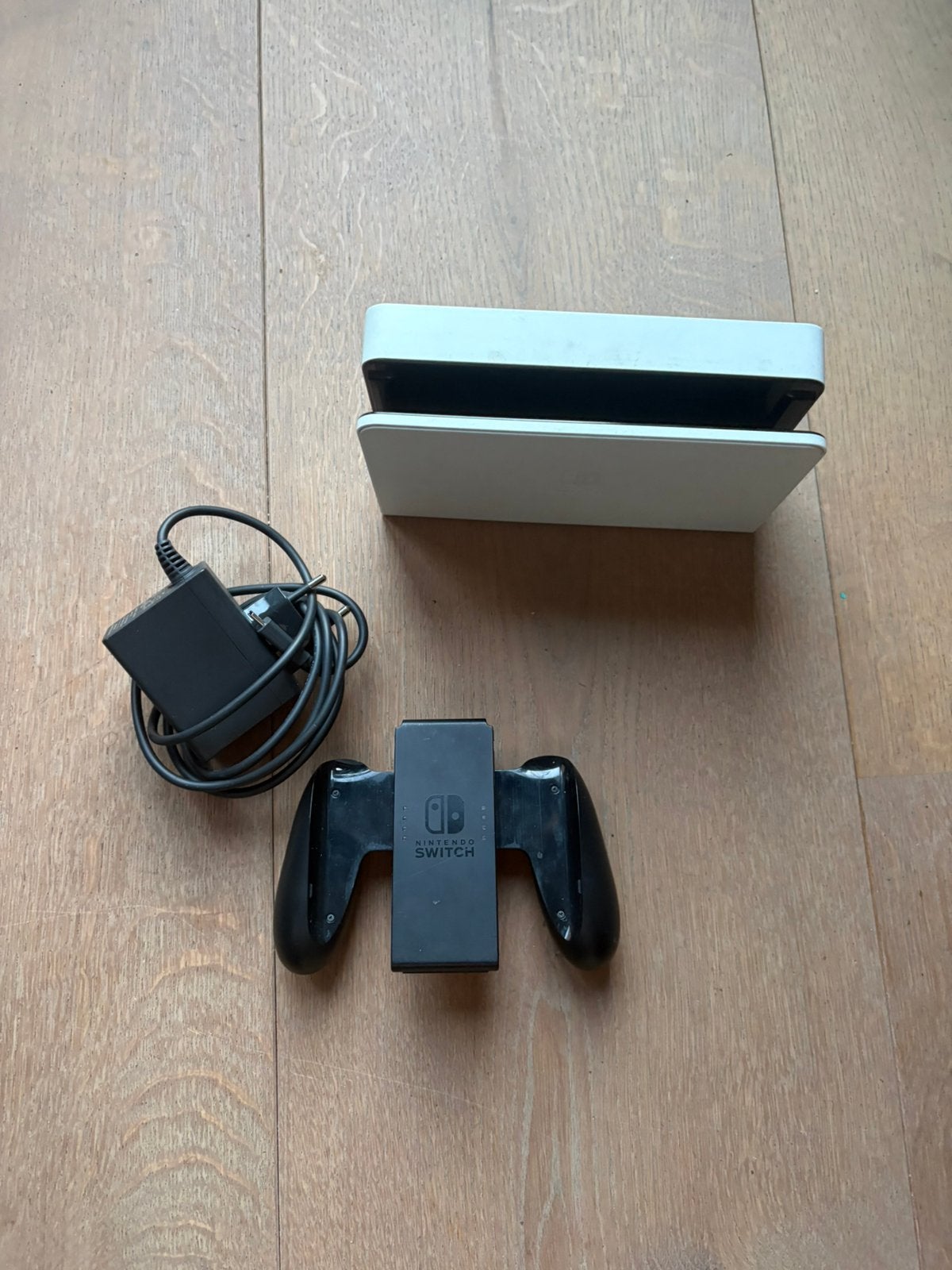 Nintendo Switch docking station, Joy-Con handgrip en oplader, Ophalen of Verzenden, Zo goed als nieuw, Switch Original