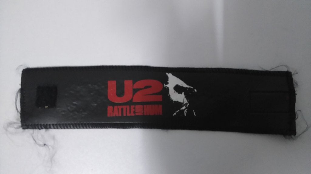 U2 Rattle and Hum logo polsband pols band vintage muziek, Ophalen of Verzenden, Gebruikt