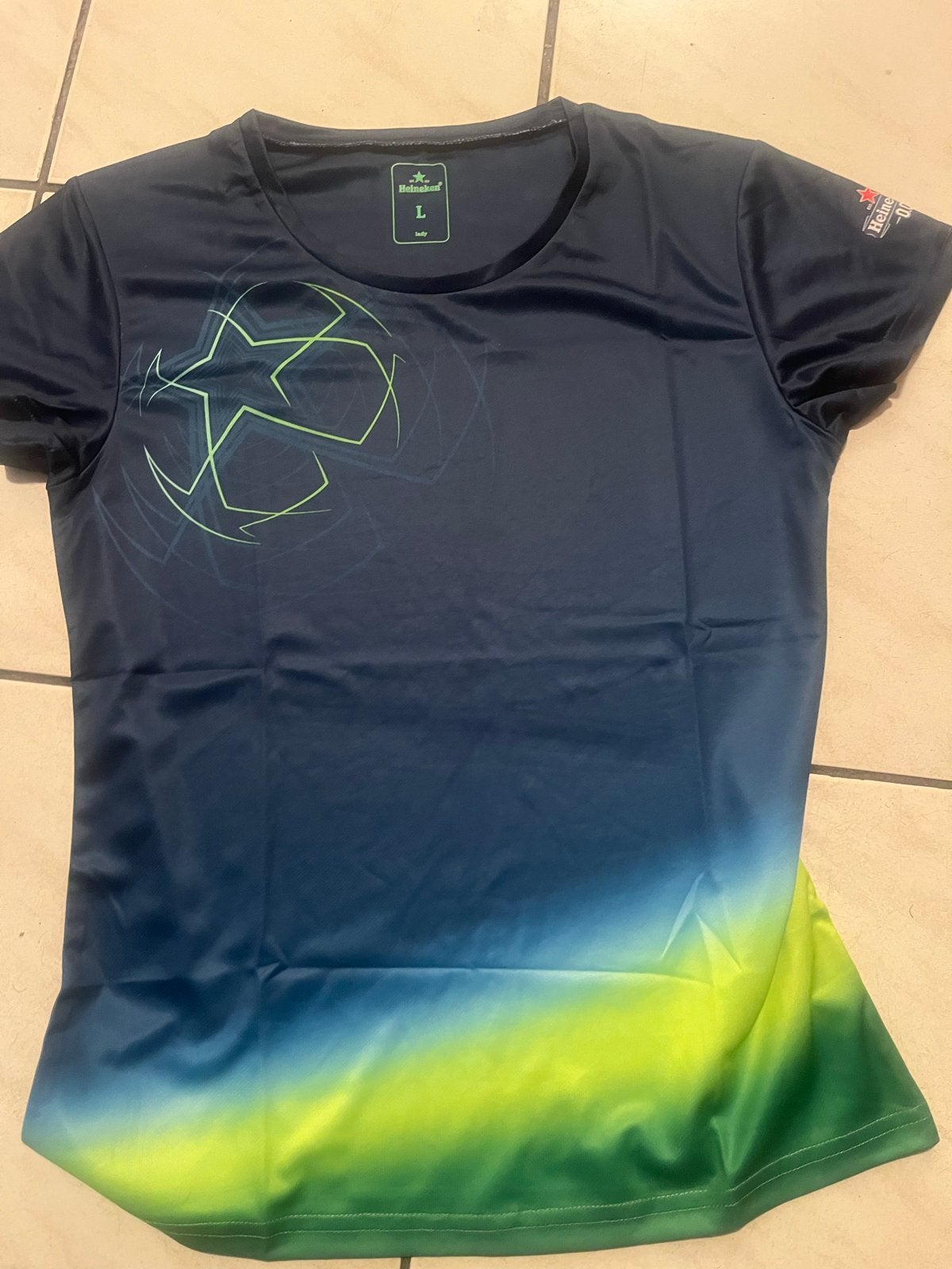 Heineken Champions League Sportshirt Maat L, Blauw, Maat 42/44 (L), Nieuw, Ophalen of Verzenden