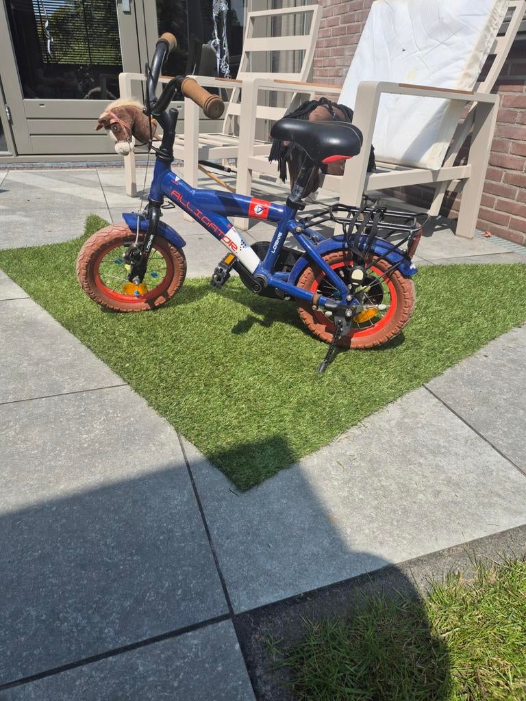 Loekie Alligator 12 inch kinderfiets - fietst nog goed!, Ophalen, Gebruikt, Velgrem, Minder dan 16 inch