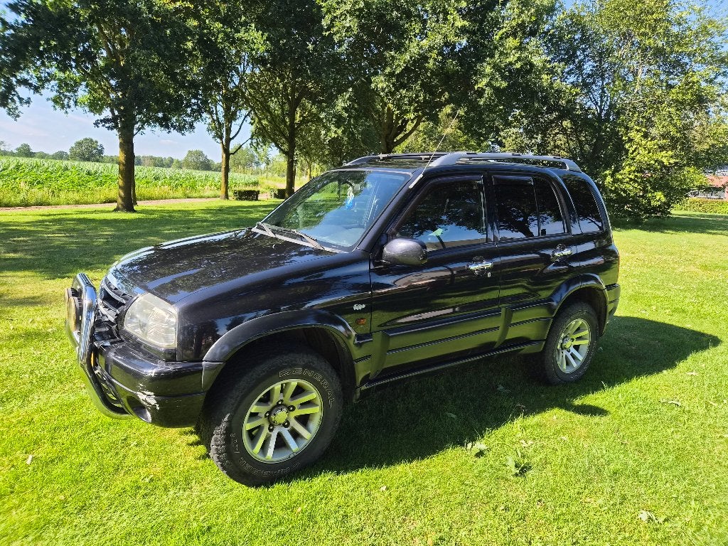 Suzuki Grand Vitara 2.0 5D 2005 Zwart, Auto's, Suzuki, 1330 kg, 1995 cc, 4 cilinders, Grand Vitara
