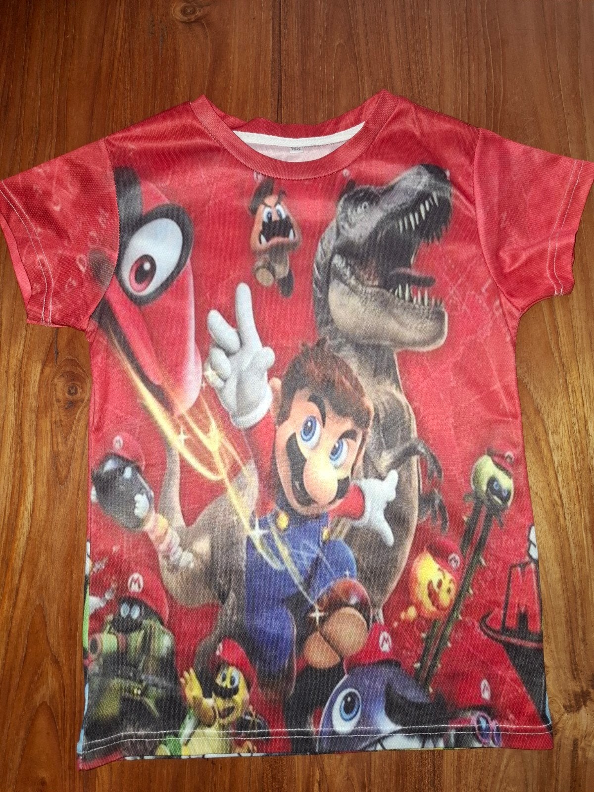 Super Mario shirtje maat 140 nieuw, Super Mario, Jongen of Meisje, Nieuw, Ophalen of Verzenden