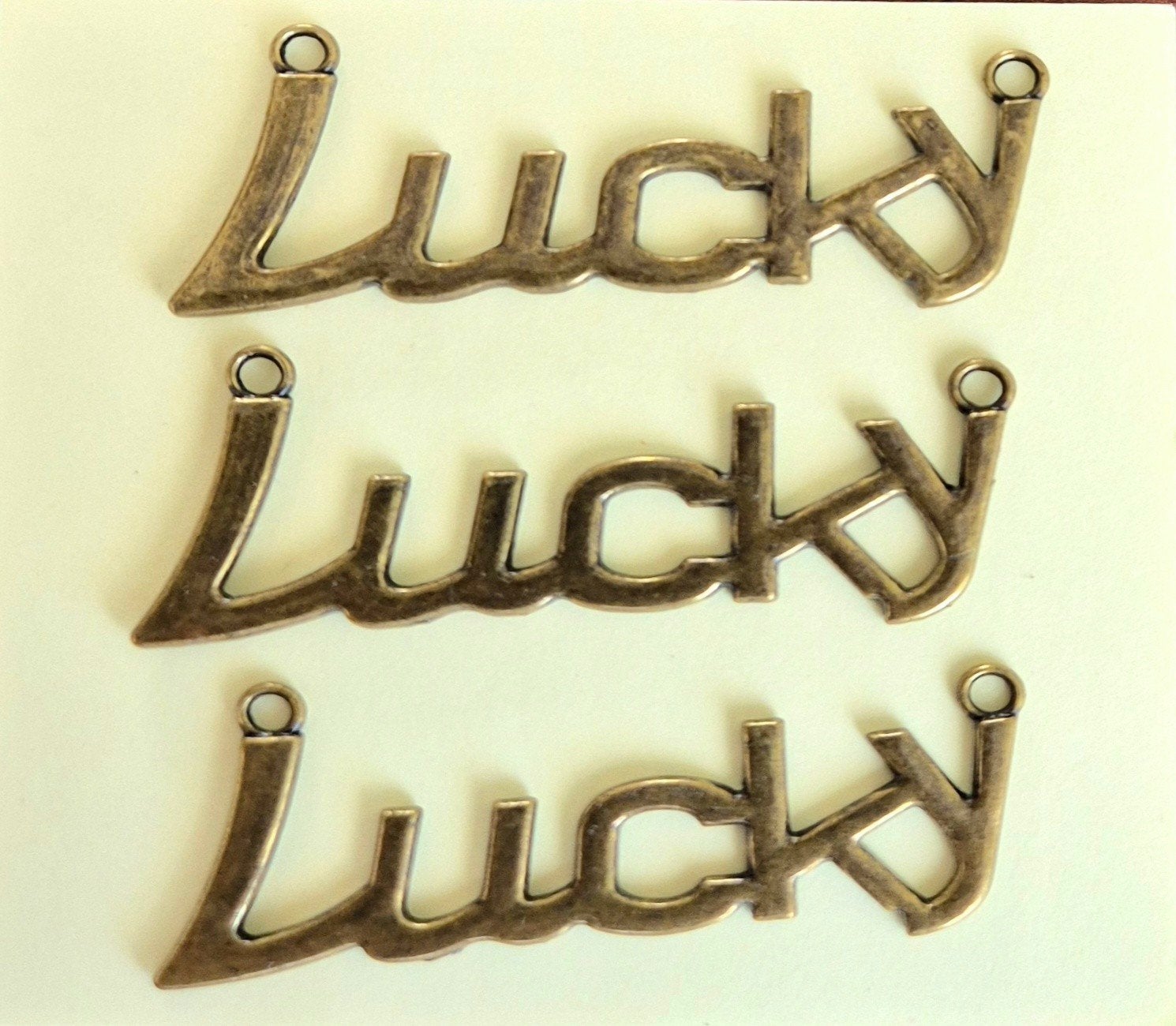 3x Bedel 'Lucky' - 22x55mm, Overige merken, Overige materialen, Nieuw, Ophalen of Verzenden