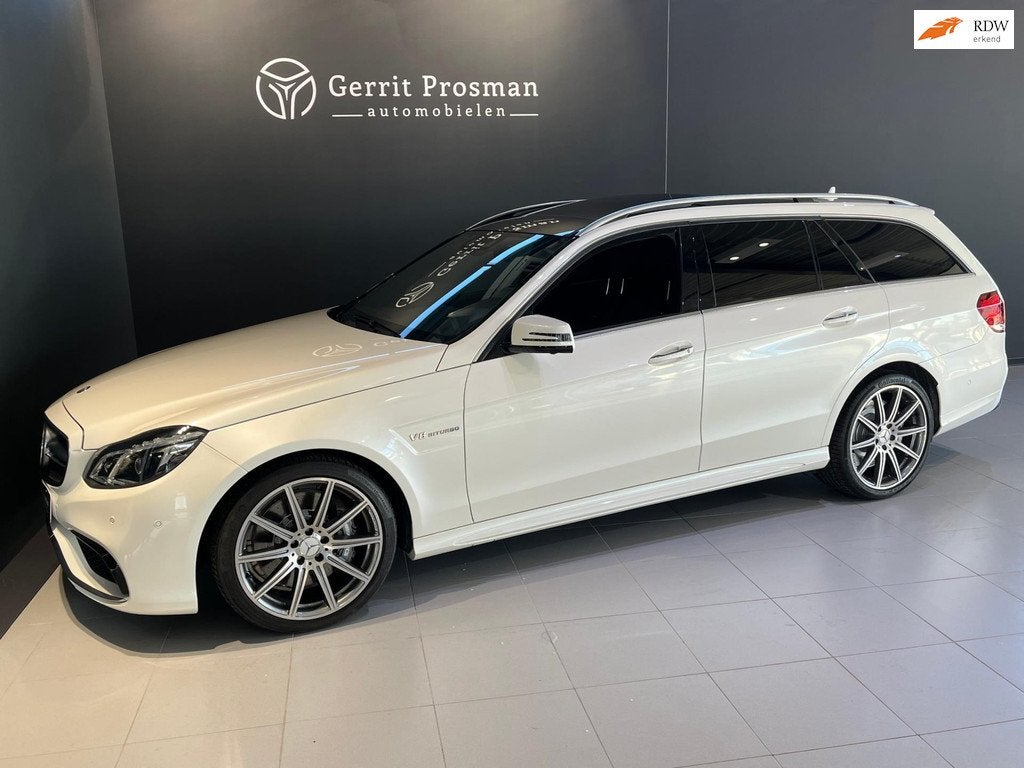 Mercedes-Benz E-klasse Estate E63 AMG 5.5 V8 Bi-Turbo 4MATIC, Auto's, Gebruikt, Wit, Leder, Stationwagon