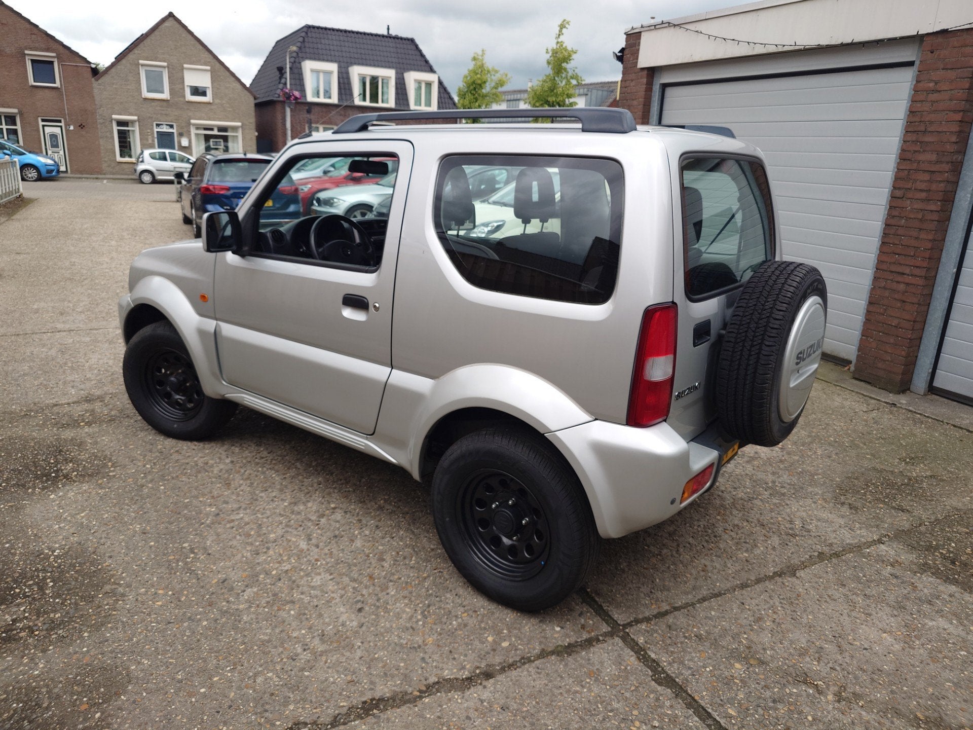 Suzuki Jimny 1.3 JLX Dealer onderhouden, Origineel NL met NA, Auto's, Keurmerk '100% Onderhouden', Zwart, 4 stoelen, Bedrijf