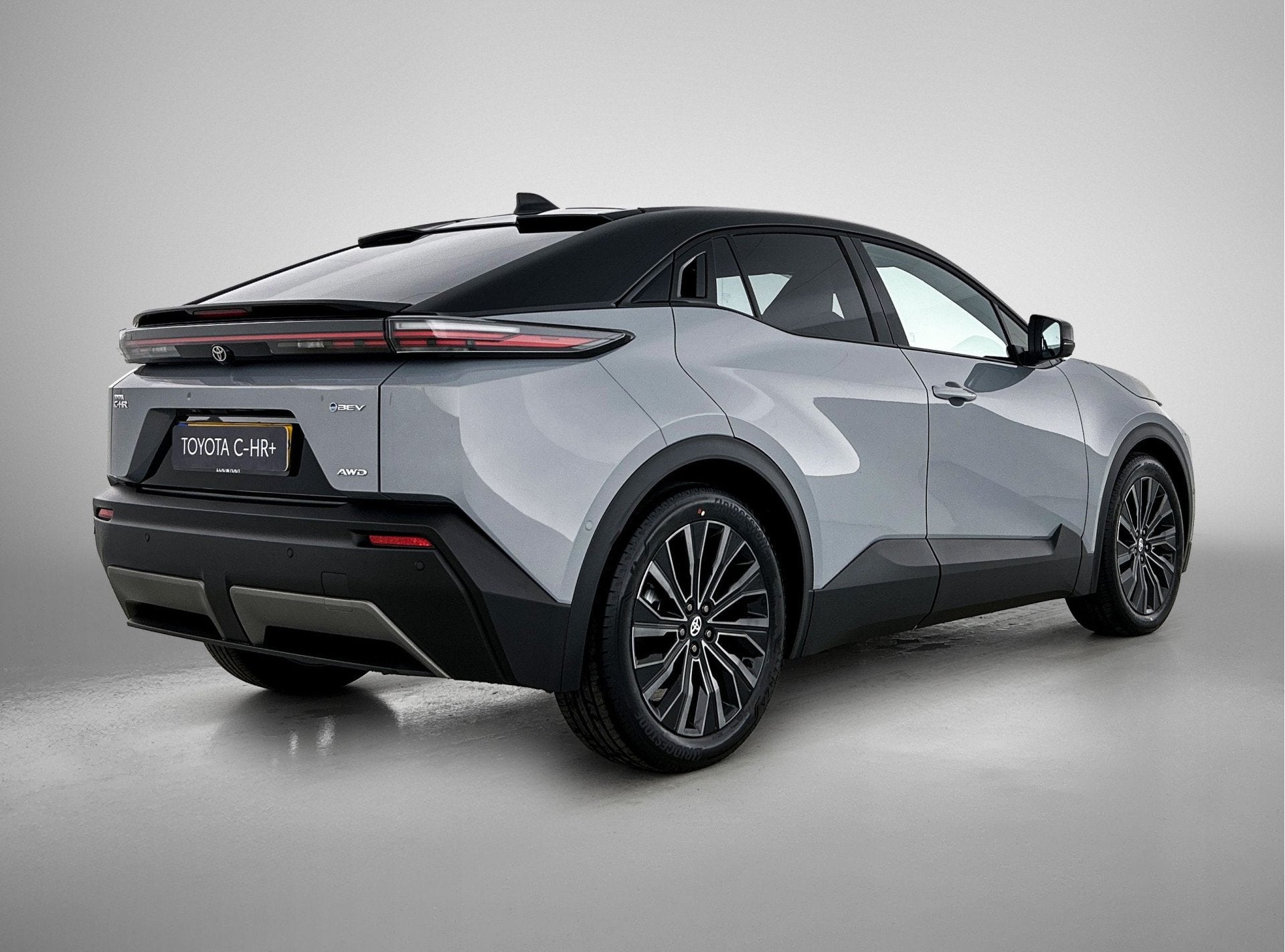 Toyota C-HR+ Executive AWD 77 kWh EV-Deal | Stoel en stuurwi, Auto's, Automaat, Stof, Gebruikt, 24 min