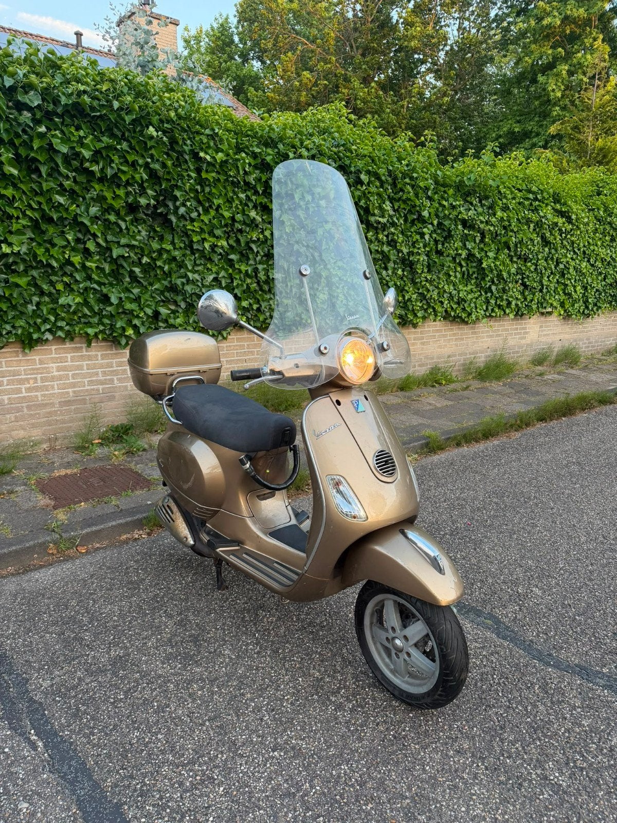 Vespa LX geel kenteken milleuzone roboslot topkoffer, Ophalen, Gebruikt, Maximaal 45 km/u, 49 cc