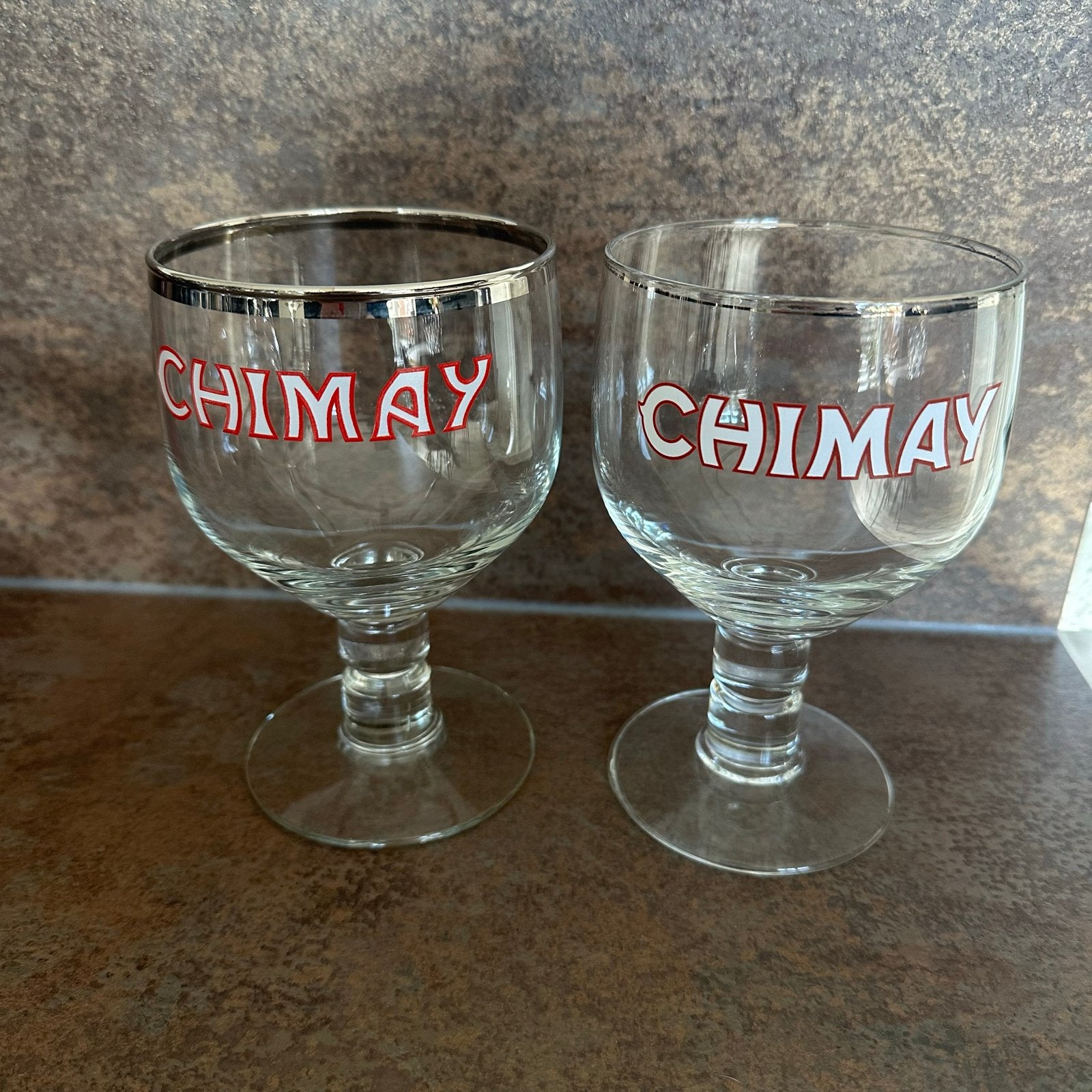 Set van 2 Chimay bierglazen met zilveren rand, Ophalen of Verzenden