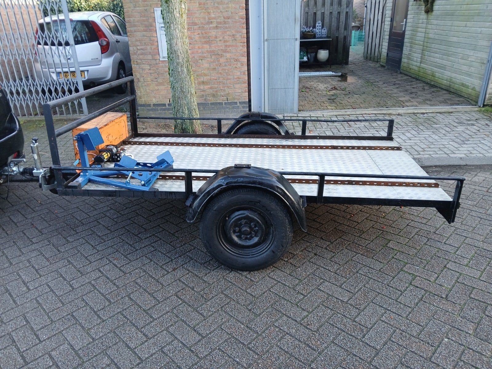 Multiefunctionele aanhanger, Ophalen