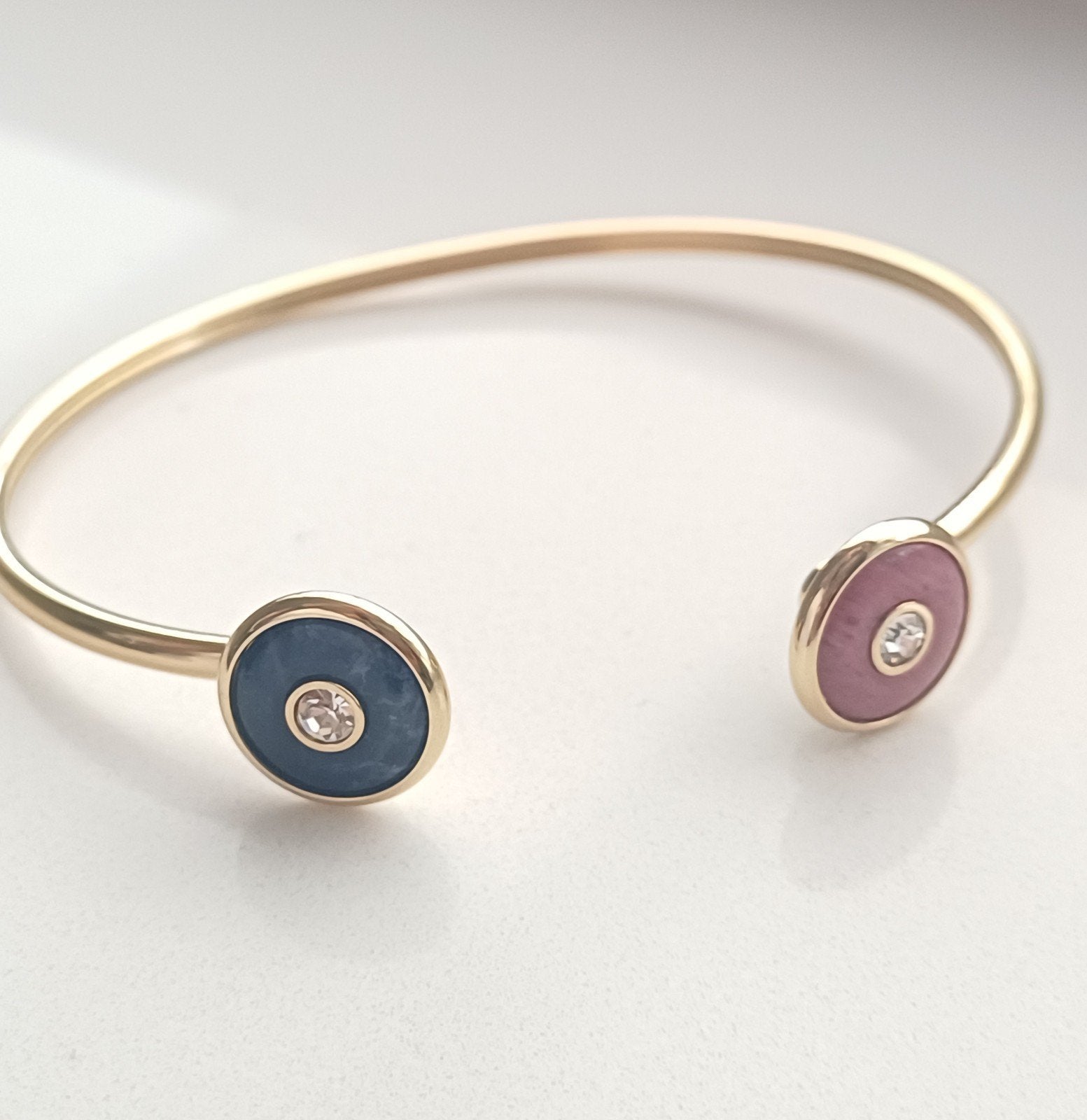 goudkleurige Melano twisted armband + zettingen, Ophalen of Verzenden