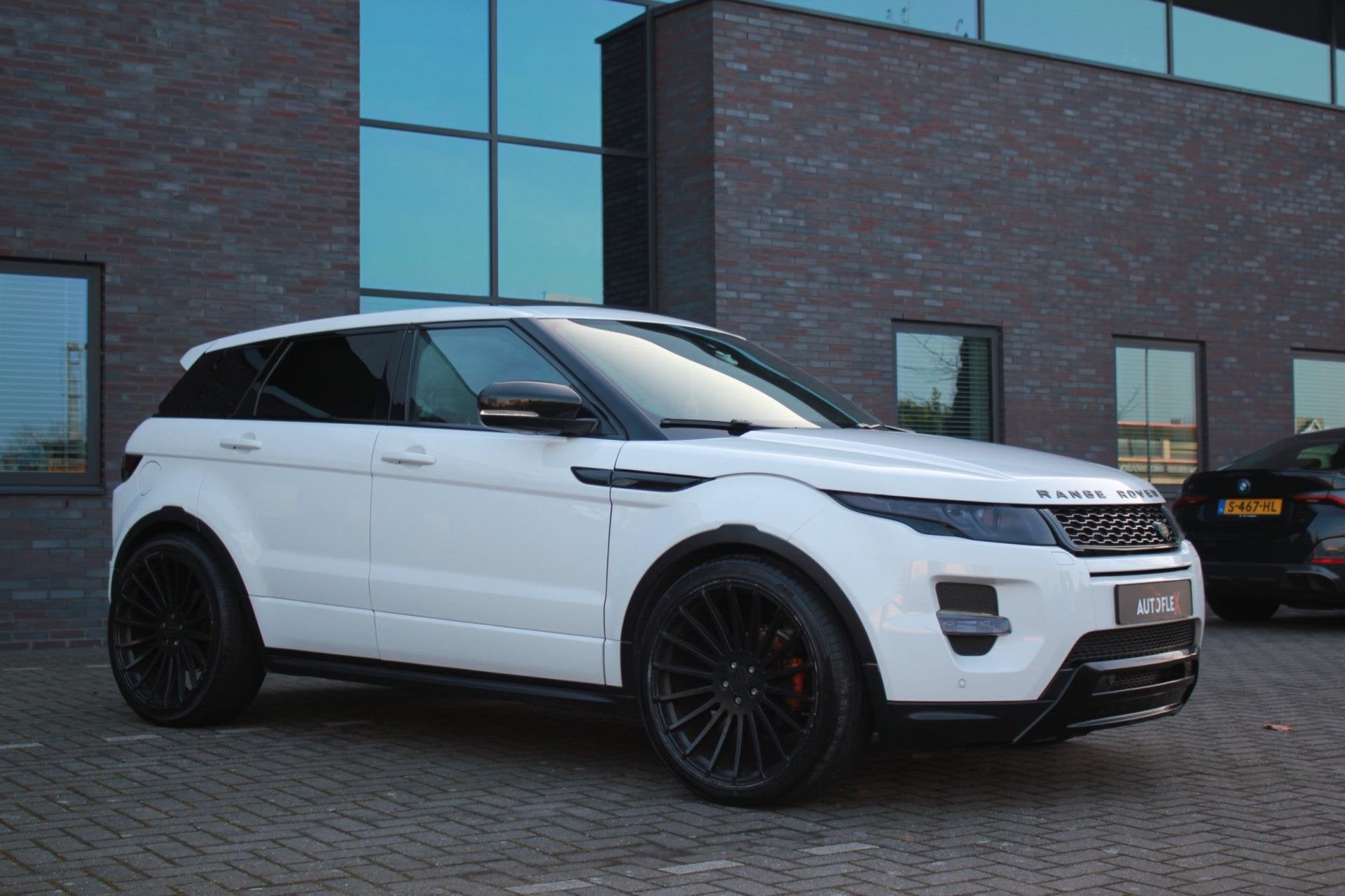Land Rover Range Rover Evoque 2.0 Si 4WD Prestige, Auto's, Land Rover, Automaat, Euro 5, 4 cilinders, Wit