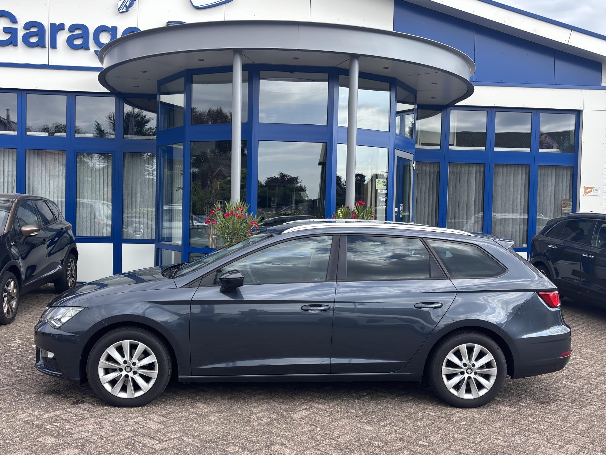 SEAT Leon ST 1.0 EcoTSI Style Business Intense l Camera, Par, Auto's, Stof, Gebruikt, Euro 6, Leon