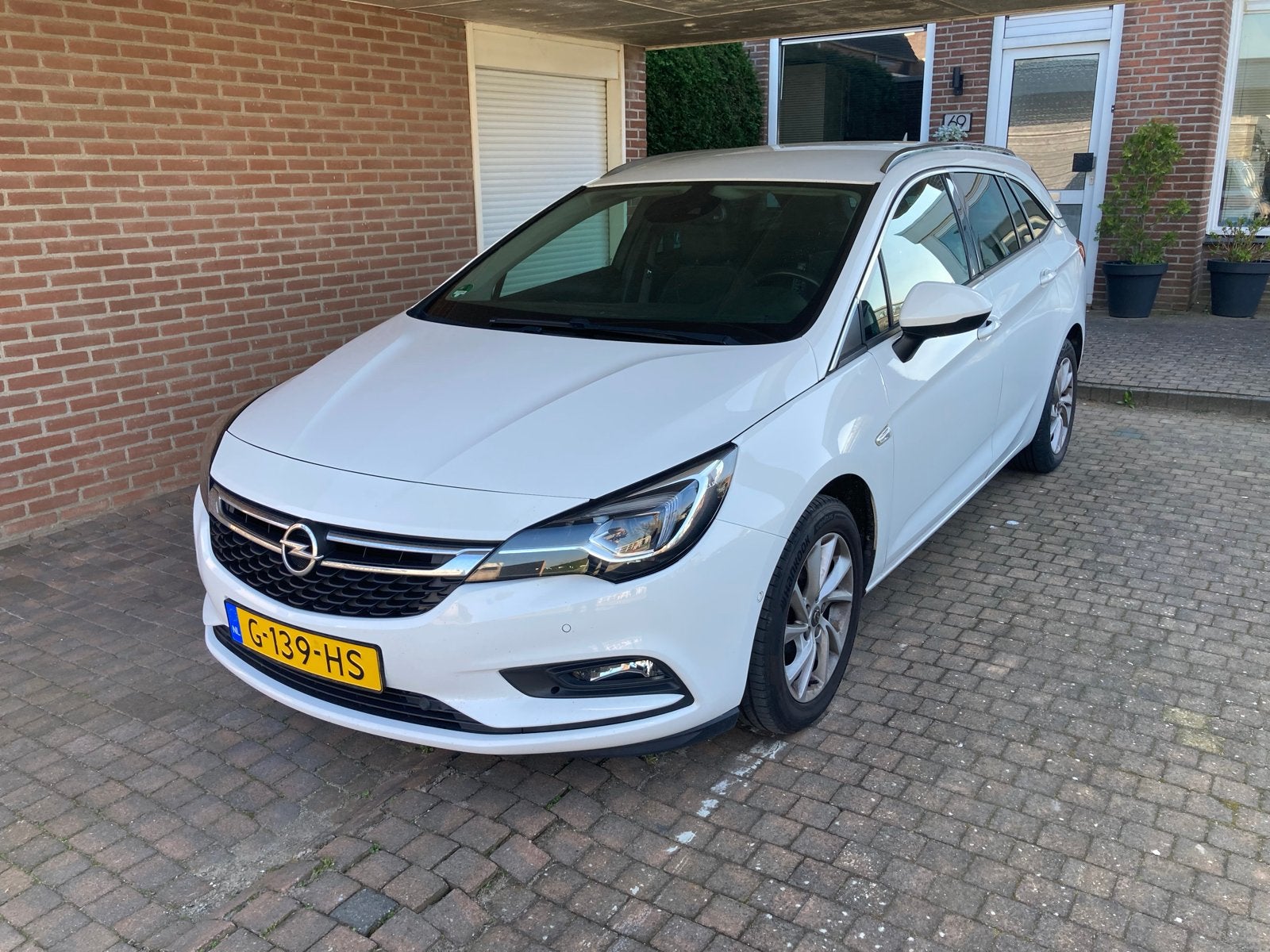 Opel Astra Sports Tourer 1.0 Innovation NL auto lage km, Auto's, Voorwielaandrijving, 1178 kg, Lane Keeping Assist, Wit