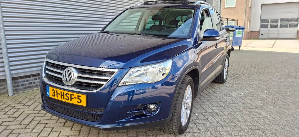 Volkswagen Tiguan 1.4 TSI TREND& 4 FUN MOTION panoramadak., Voorwielaandrijving, Zwart, 4 cilinders, 2000 kg