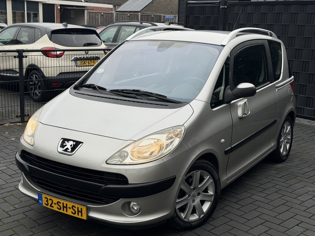 Peugeot 1007 1.4 Gentry| GRIJS| 167DKM NAP| CLIMA| CRUISE| L, Auto's, Stof, Verwarmde buitenspiegels, 4 cilinders, 4 stoelen