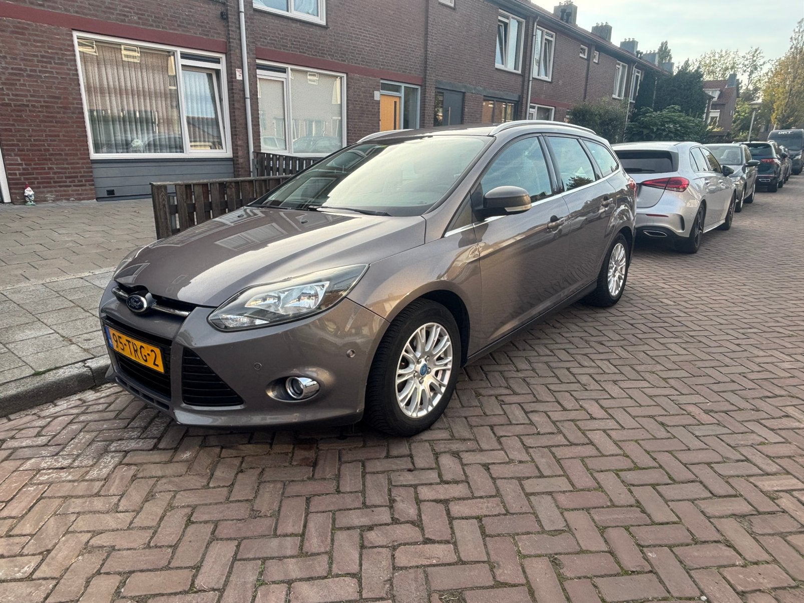 Ford Focus 1.6 Ti-vct TiTANiUM 92KW 2012 NWE MOTOR 90 DKM, 1596 cc, 125 pk, 4 cilinders, Bruin