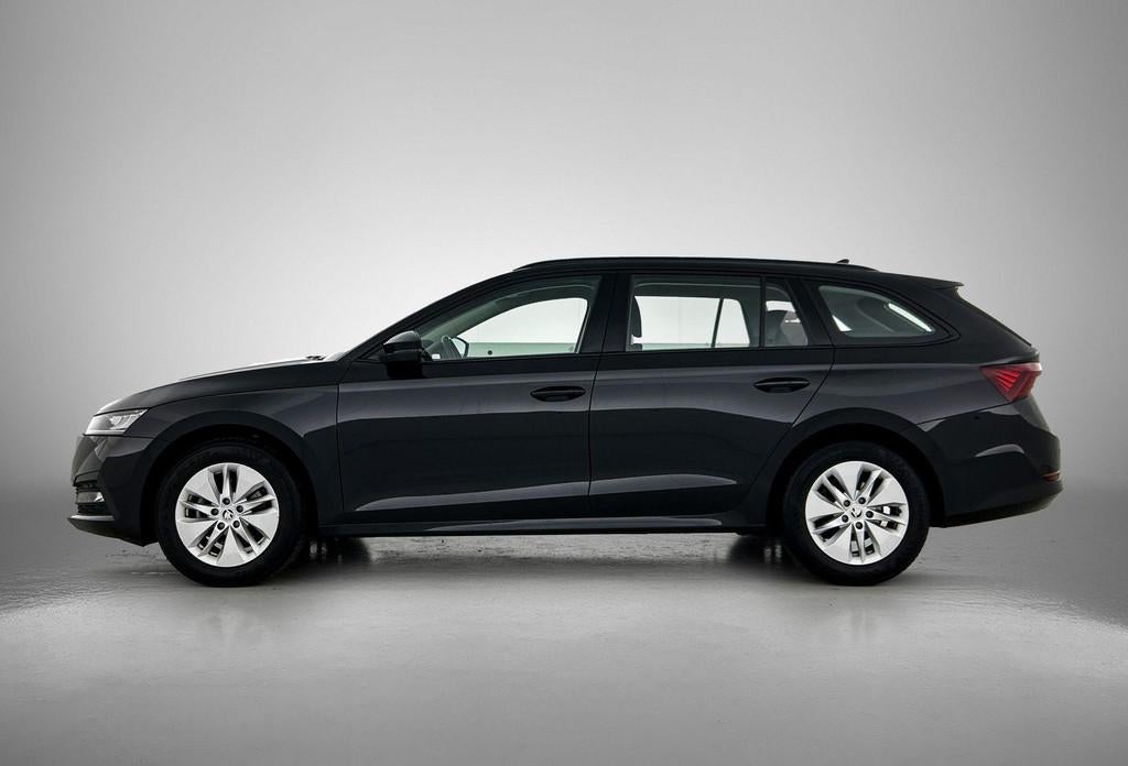 Skoda Octavia Combi 1.0 e-TSI Business Edition | PARKEERSENS, Auto's, Skoda, 12 maanden, Stof, Gebruikt, Zwart