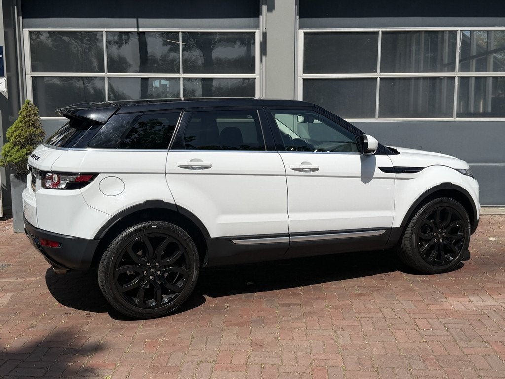 Land Rover Range Rover Evoque 2.0 Si 4WD Prestige Automaat,L, Auto's, Land Rover, Automaat, Euro 5, Zwart, 4 cilinders