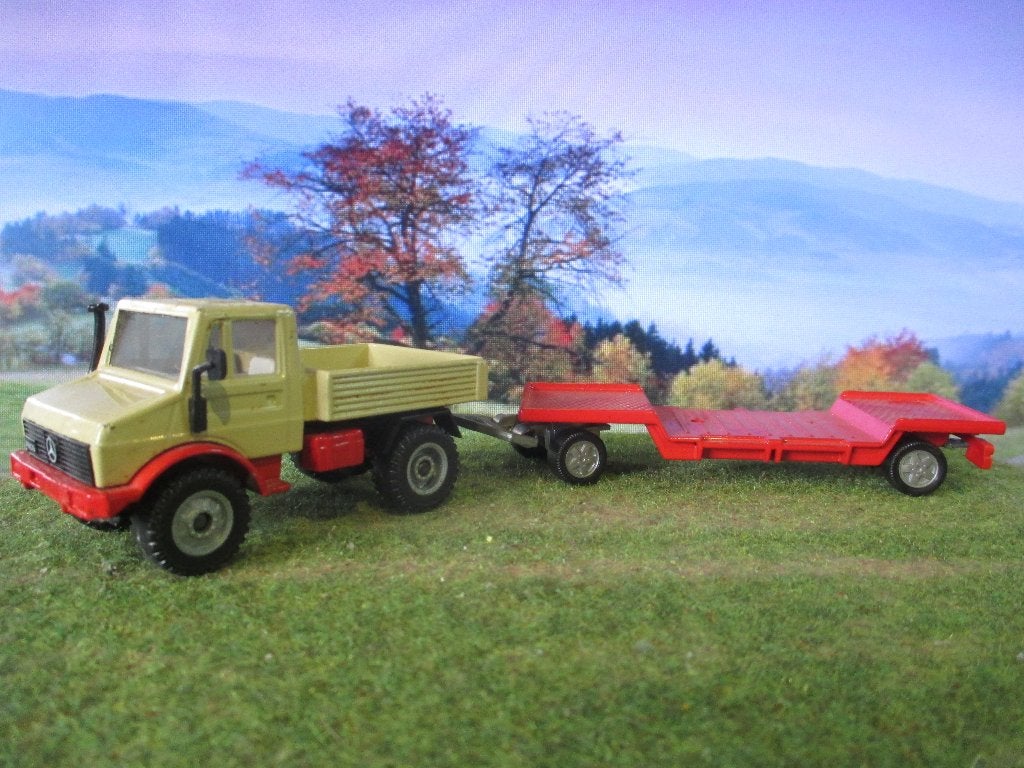 1/55 Mercedes Benz Unimog U1500 met dieplader SiKu i.z.g.st., Ophalen of Verzenden, Zo goed als nieuw, Bus of Vrachtwagen, SIKU