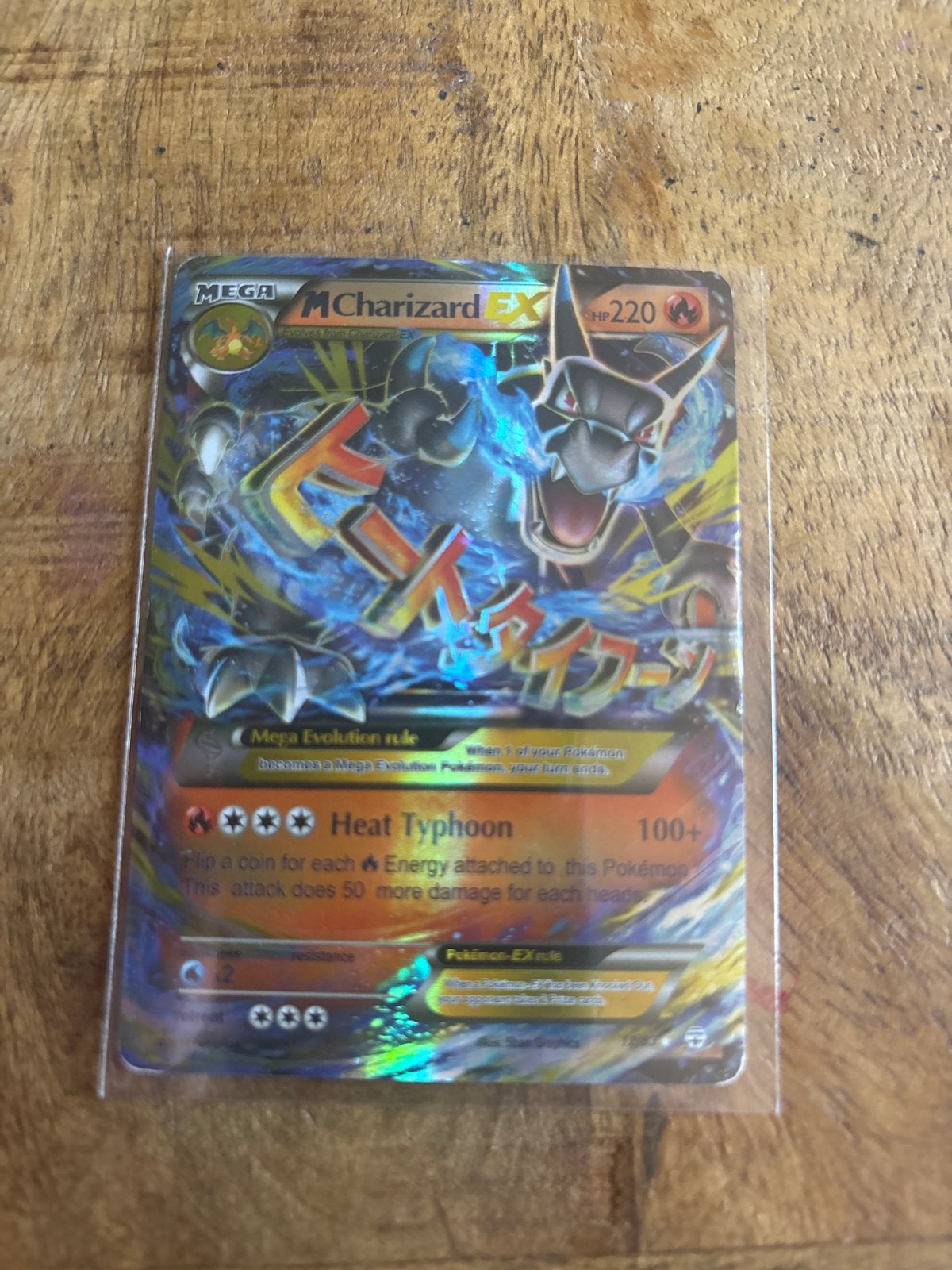 Pokémon M Charizard EX (Japanse versie), Ophalen of Verzenden, Zo goed als nieuw, Losse kaart, Foil