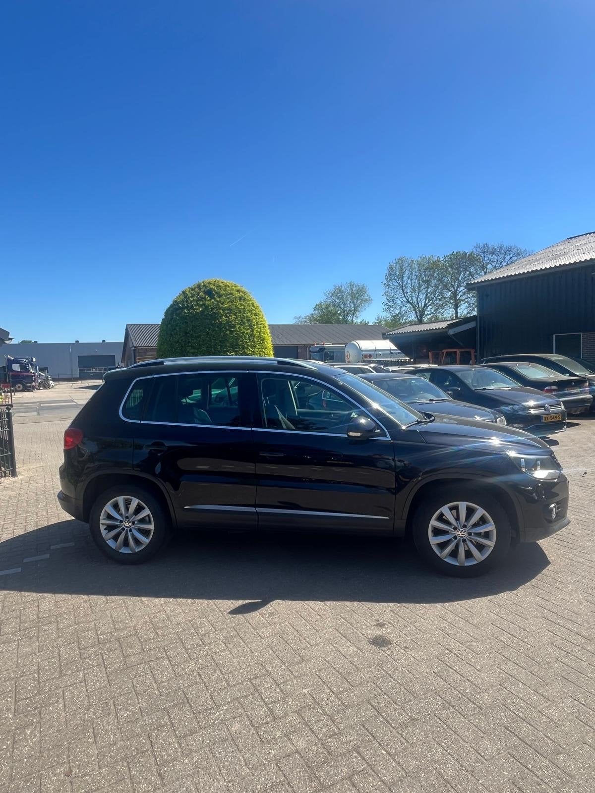Volkswagen Tiguan 1.4 TSI Sport&Style, Voorwielaandrijving, Euro 5, Gebruikt, Zwart