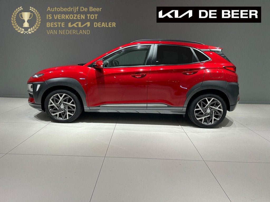 HYUNDAI Kona GDI 141pk HEV 2WD Automaat Premium Sky Unieke K, Auto's, Hyundai, Automaat, 12 maanden, Gebruikt, Leder en Stof