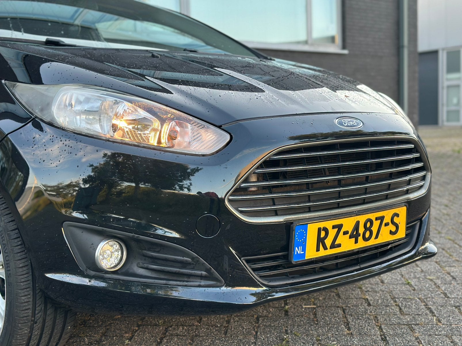 Foto 7 van Ford Fiësta 1.25 44KW 3DR 2014 Zwart/17INCH/CRPLY/NW ONDRHD