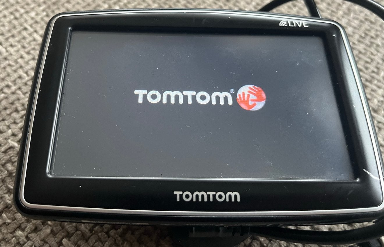 TomTom navigatiesysteem met autolader en houder, Ophalen of Verzenden, Gebruikt