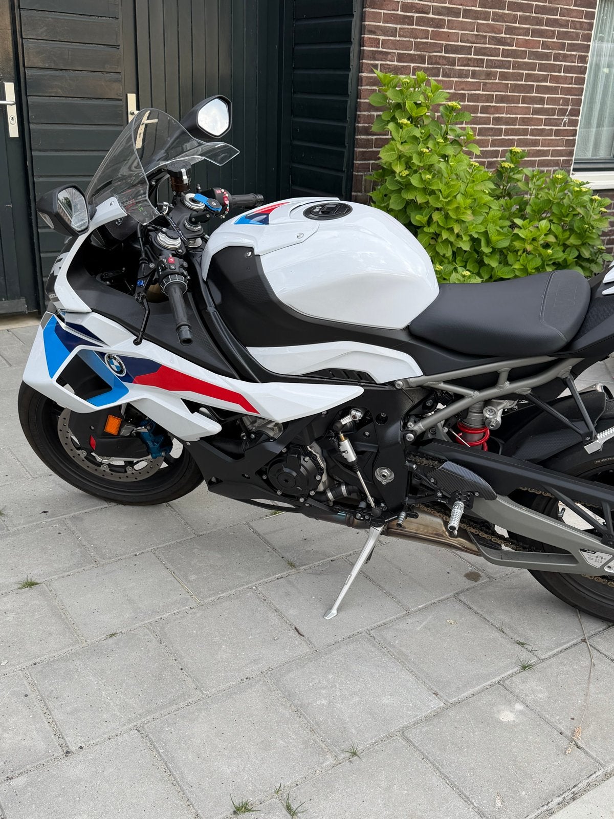 BMW S1000RR 2025 met SC + AKRA uitlaat, 2800 km, Motoren, Motoren | BMW, Sportuitlaat, Occasion, 4 cilinders, Super Sport