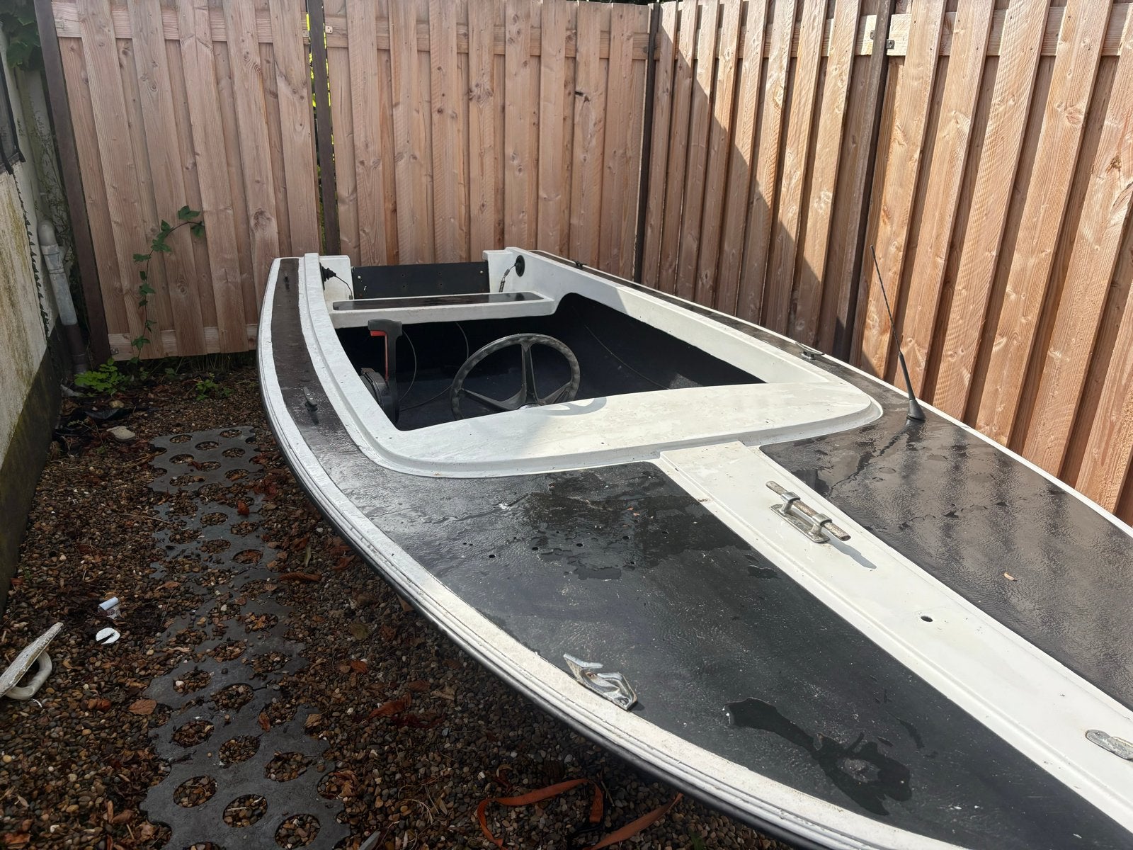 polyester boot met stuurconsole en evt met trailer, Ophalen