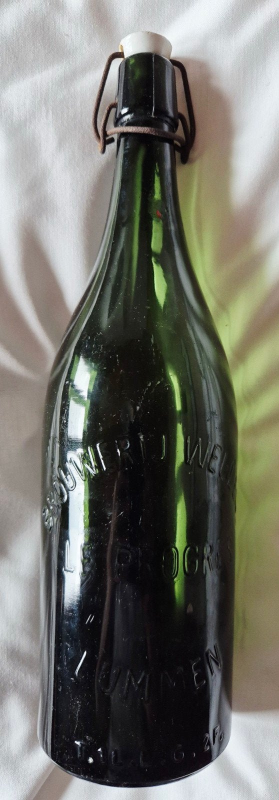 zeer oude bier fles 1950 verzamelaar uit Limburgse Lummen., Verzamelen, Ophalen of Verzenden, Flesje(s), Overige merken