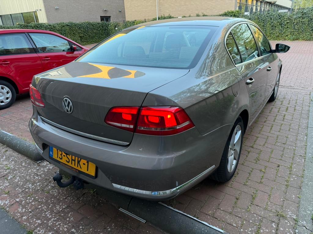 Volkswagen Passat 2.0 TDI 170pk NL 3e Comfortline Bluemotion, Auto's, Voorwielaandrijving, 1800 kg, 4 cilinders, Bruin