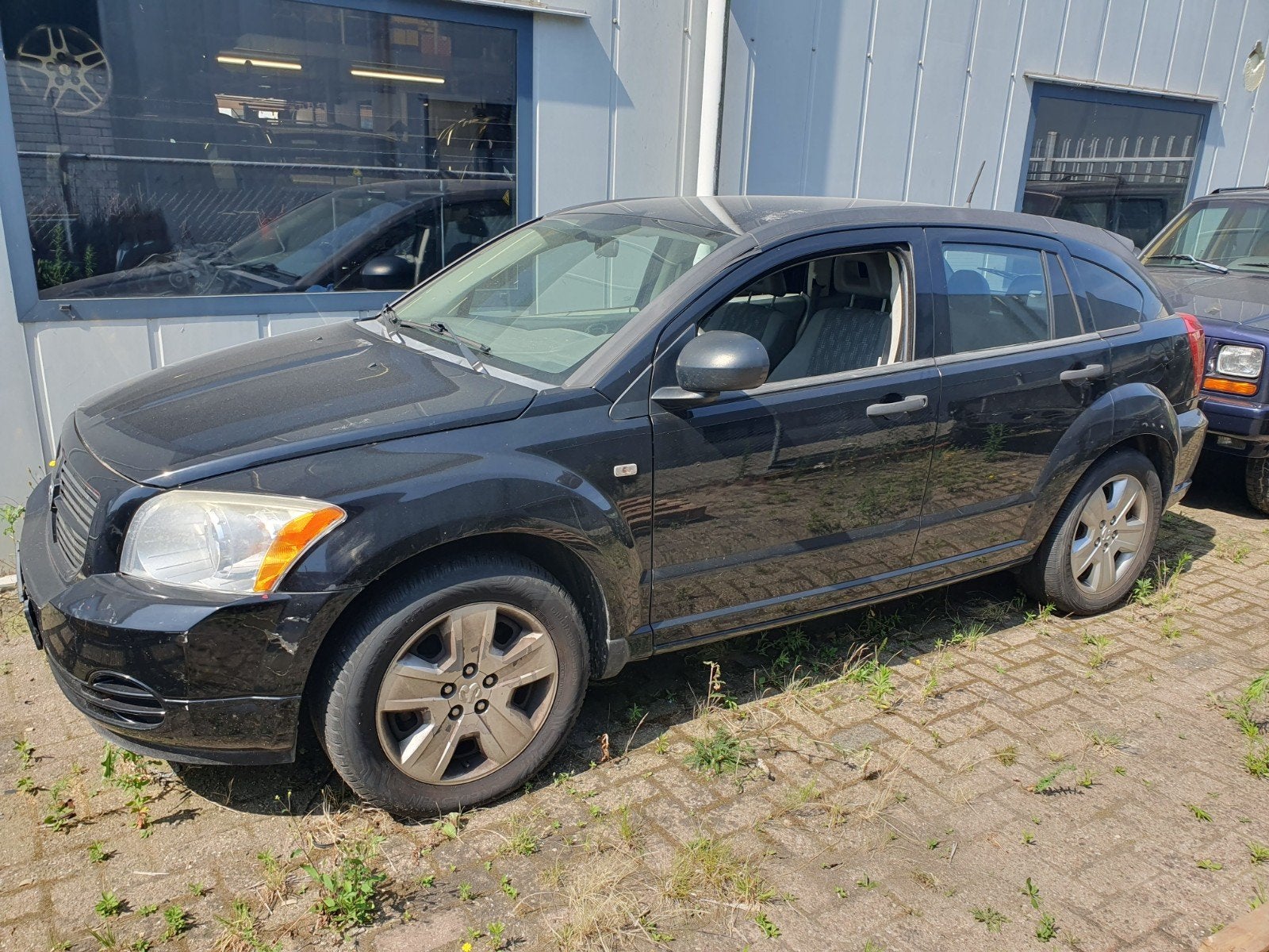 Dodge Caliber 1.8 2006 Zwart, Auto's, Dodge, Particulier, Caliber, Benzine, C, Hatchback, Handgeschakeld, Origineel Nederlands