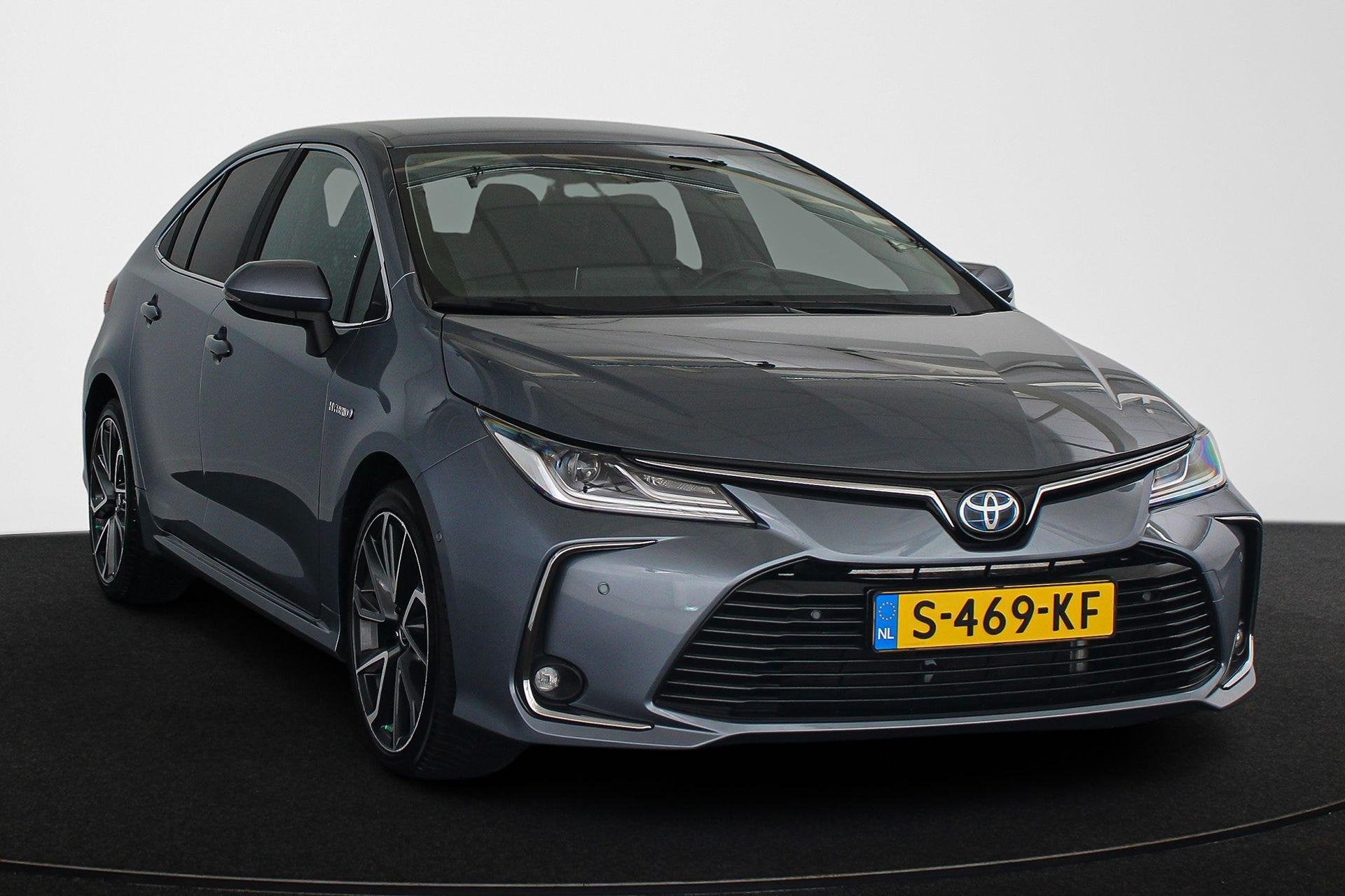 Toyota Corolla Hybrid 140 Executive Head-Up Keyless Achterui, Auto's, Gebruikt, 4 cilinders, Corolla, Lichtsensor