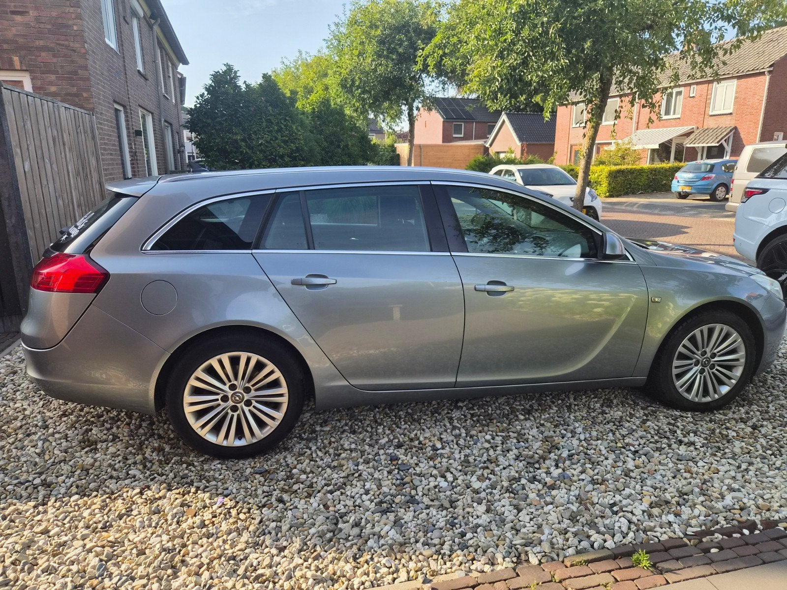 Opel Insignia 1.4 Turbo 103KW Sports Tourer 2012 Grijs, Auto's, 4 cilinders, Origineel Nederlands, Handgeschakeld, 1364 cc