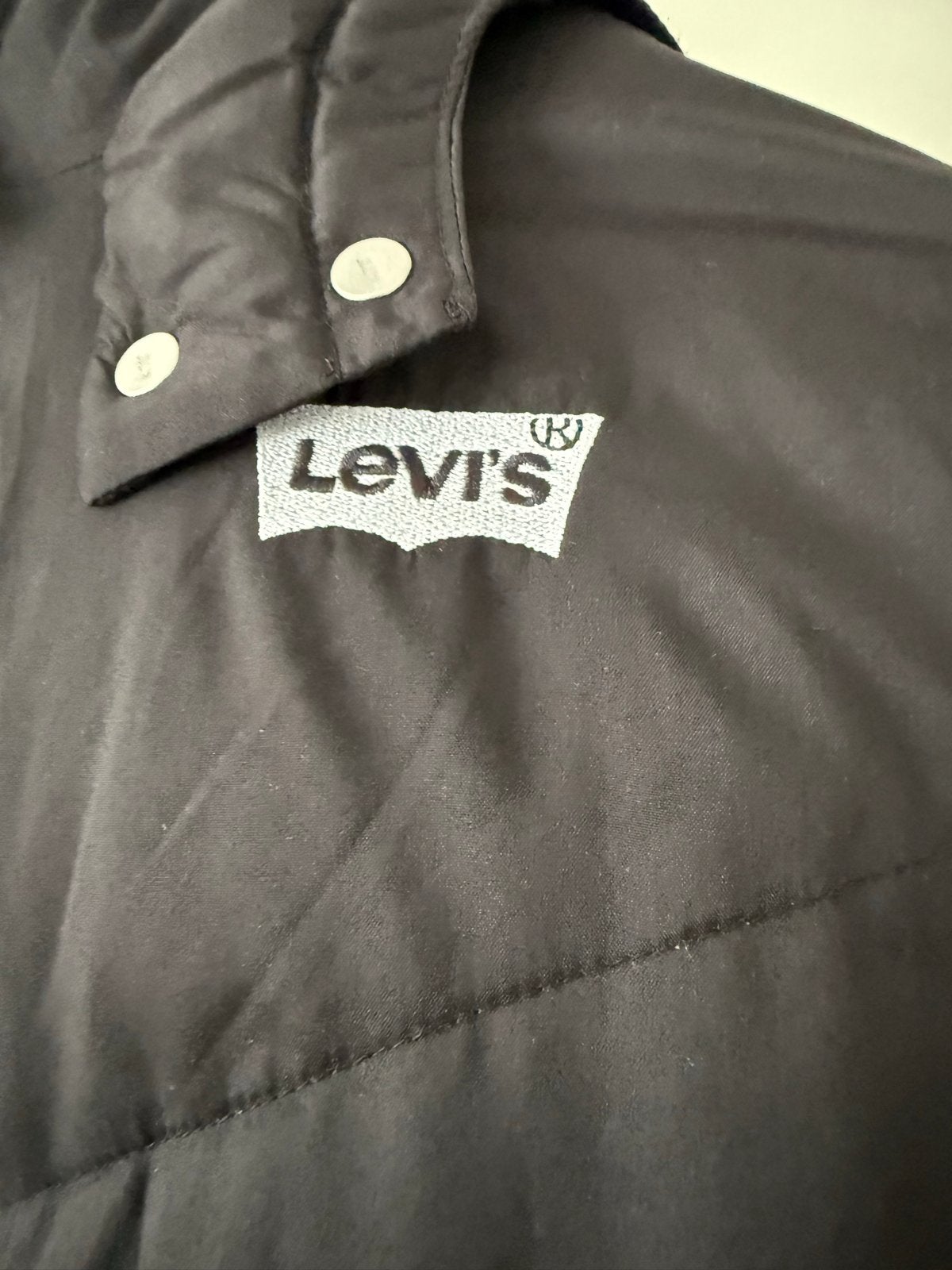 Levi's lange gewatteerde jas - Zwart, Ophalen of Verzenden, Zo goed als nieuw, Maat 42/44 (L), Zwart