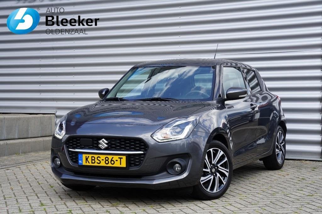 Suzuki Swift 1.2 Style Smart Hybrid 82PK Ecc Navi Cruise Cam, Auto's, 83 pk, Stof, Gebruikt, 4 cilinders