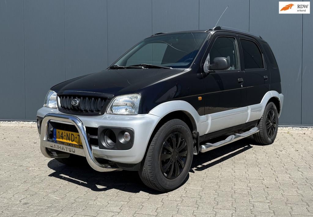 Daihatsu Terios 1.3 DX Airco Trekhaak Automaat APK t/m Jan 2, Auto's, Daihatsu, 1350 kg, 4 cilinders, 400 kg, Zwart