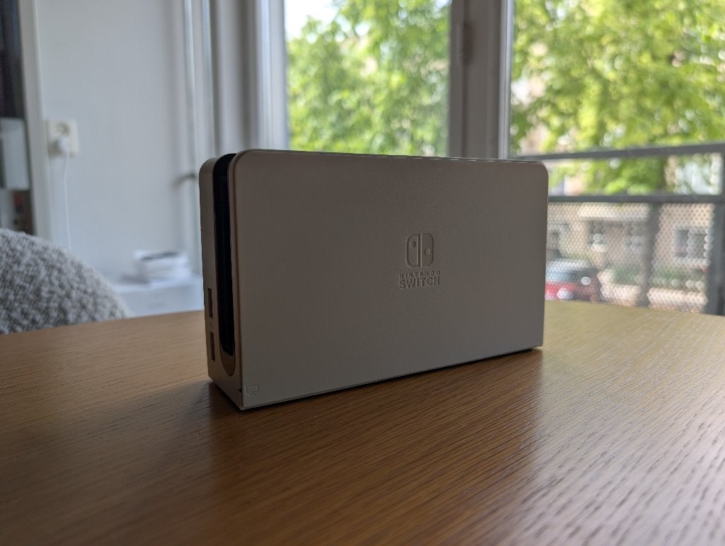 Nintendo Switch Dock (OLED editie), Spelcomputers en Games, Spelcomputers | Nintendo Switch, Ophalen of Verzenden, Zo goed als nieuw