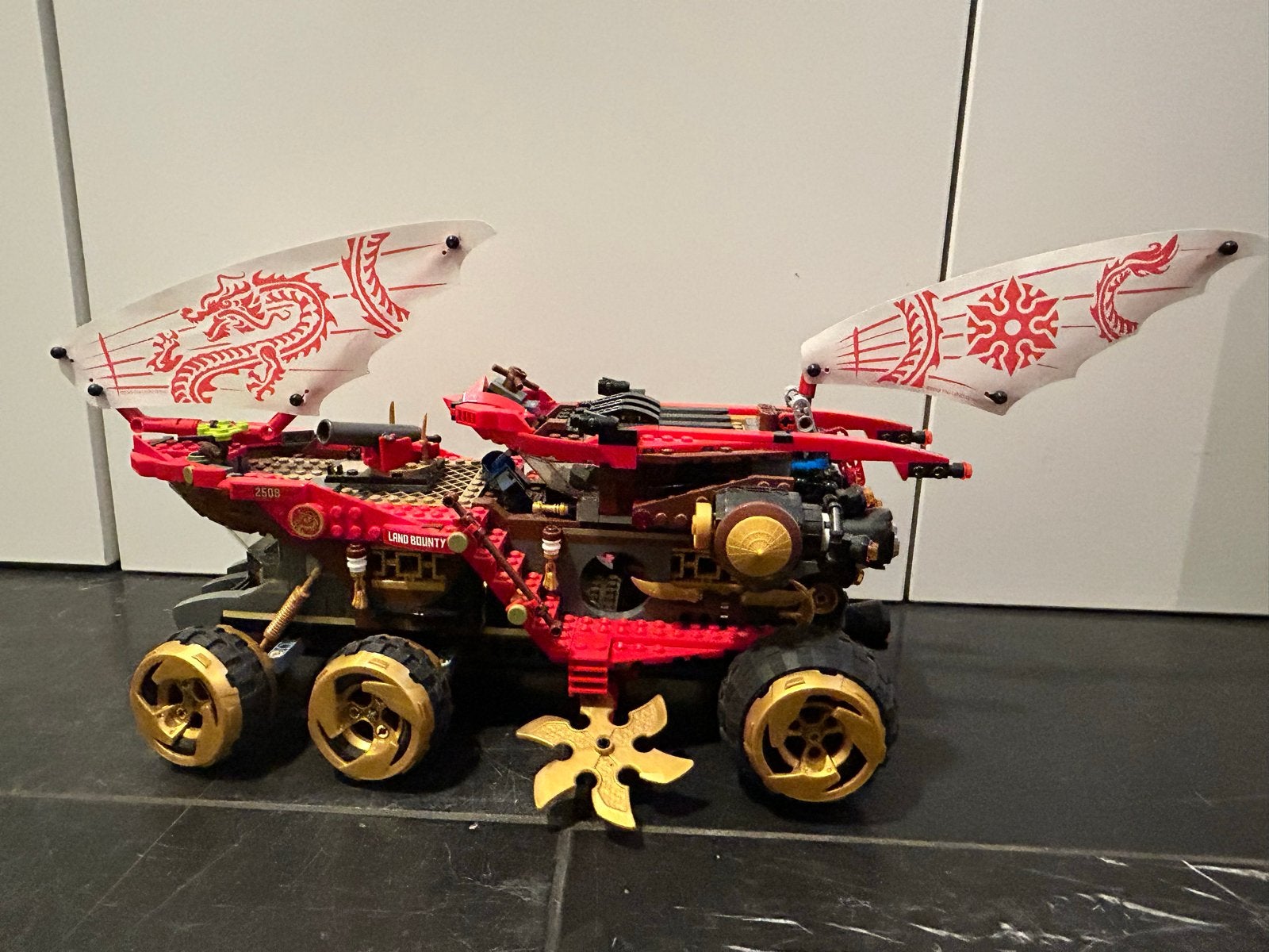 Lego Ninjago 70677 Land Bounty - Complete set met doos, Lego, Ophalen of Verzenden, Zo goed als nieuw, Compleet
