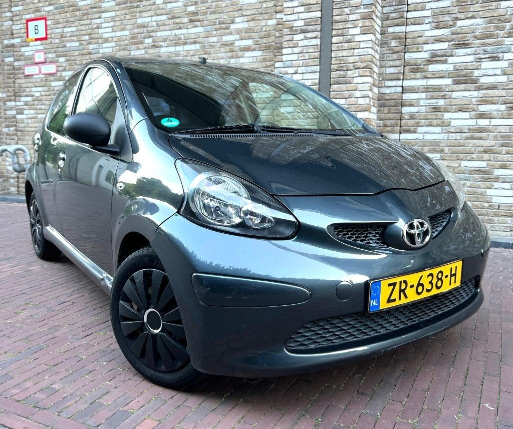 Toyota Aygo 1.0-12V 5DRS Dyna Pakket | Airco | NW APK | Navi, Auto's, Voorwielaandrijving, Stof, Euro 6, 68 pk