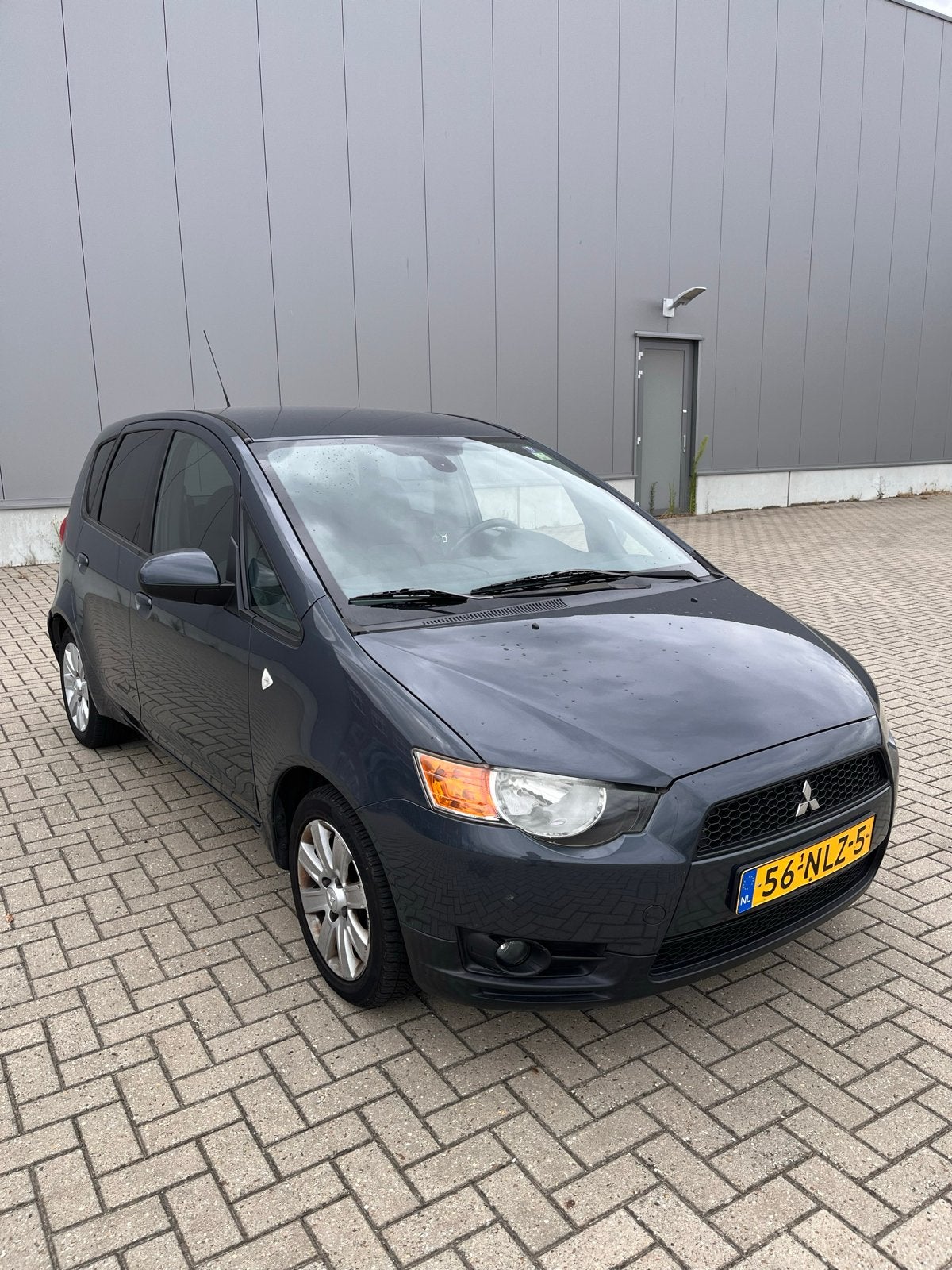 Mitsubishi Colt 1.3 5-DR 2010 Grijs, Auto's, Mitsubishi, Voorwielaandrijving, 31 €/maand, Colt, Origineel Nederlands