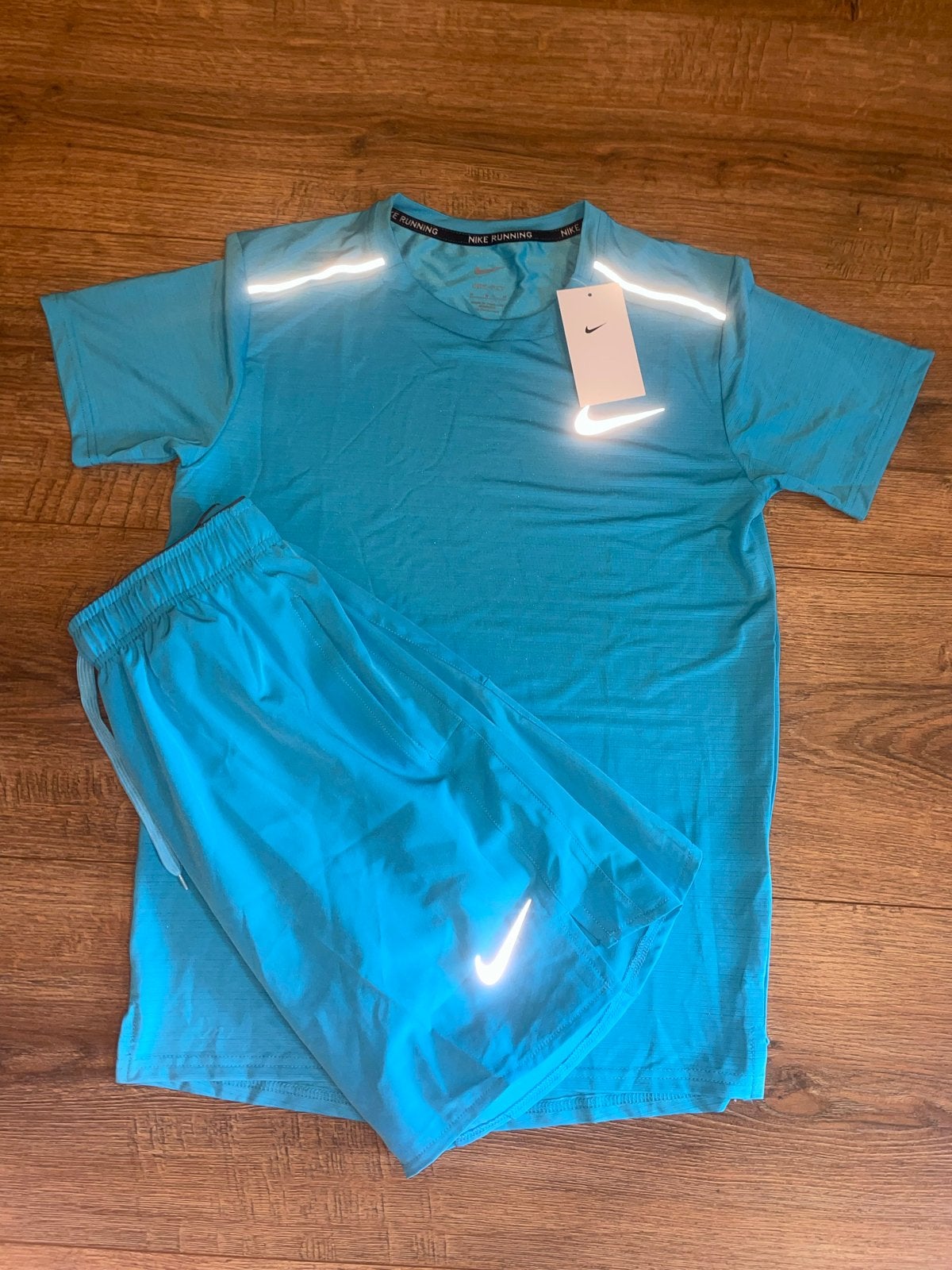 Nike Miller hardloopset - Blauw - Maat M, Nieuw, Ophalen of Verzenden, Hardlopen of Fietsen, Maat 48/50 (M)